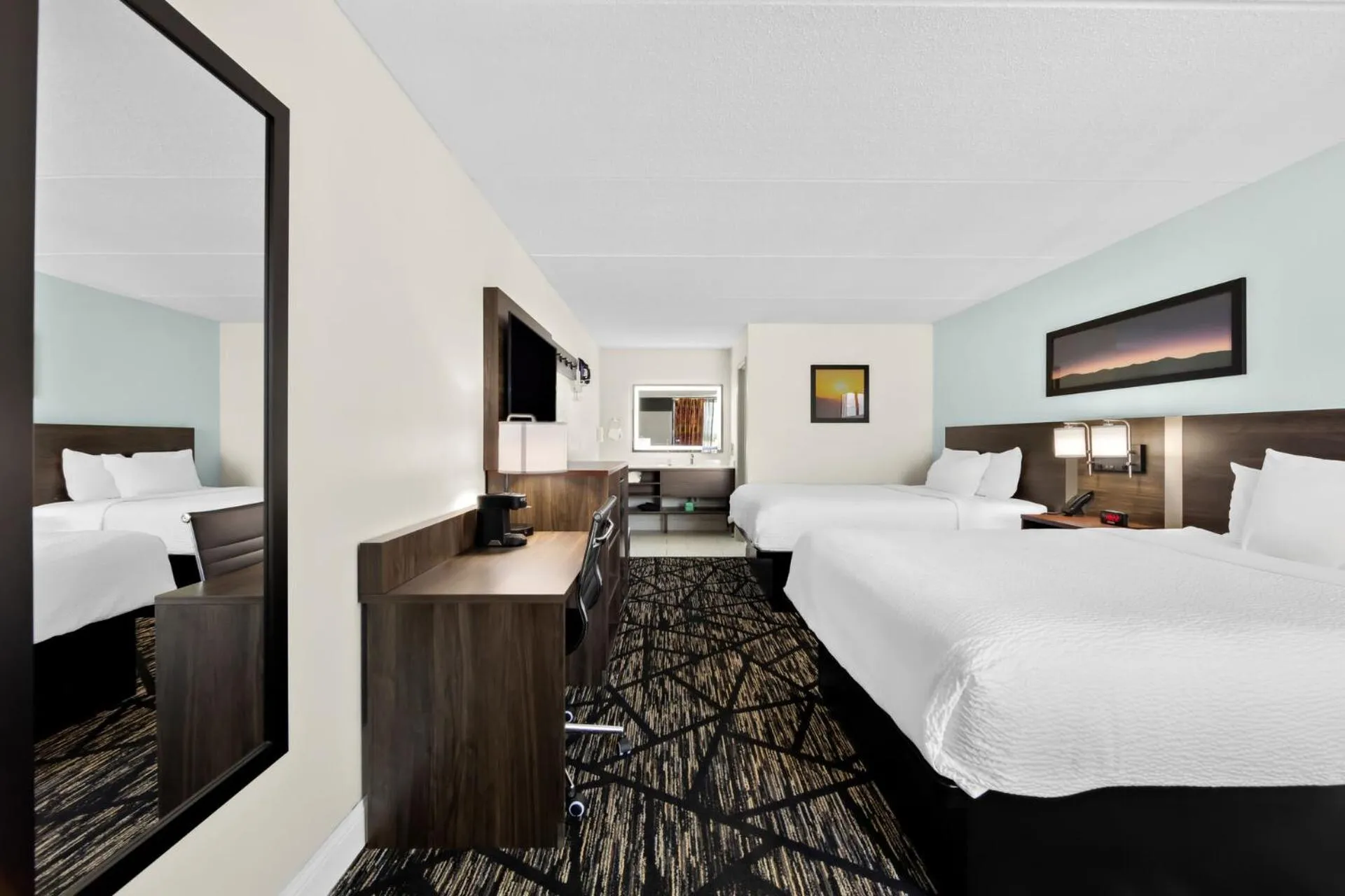 Bed in Clarion Inn & Suites near the Leconte Center Pigeon Forge