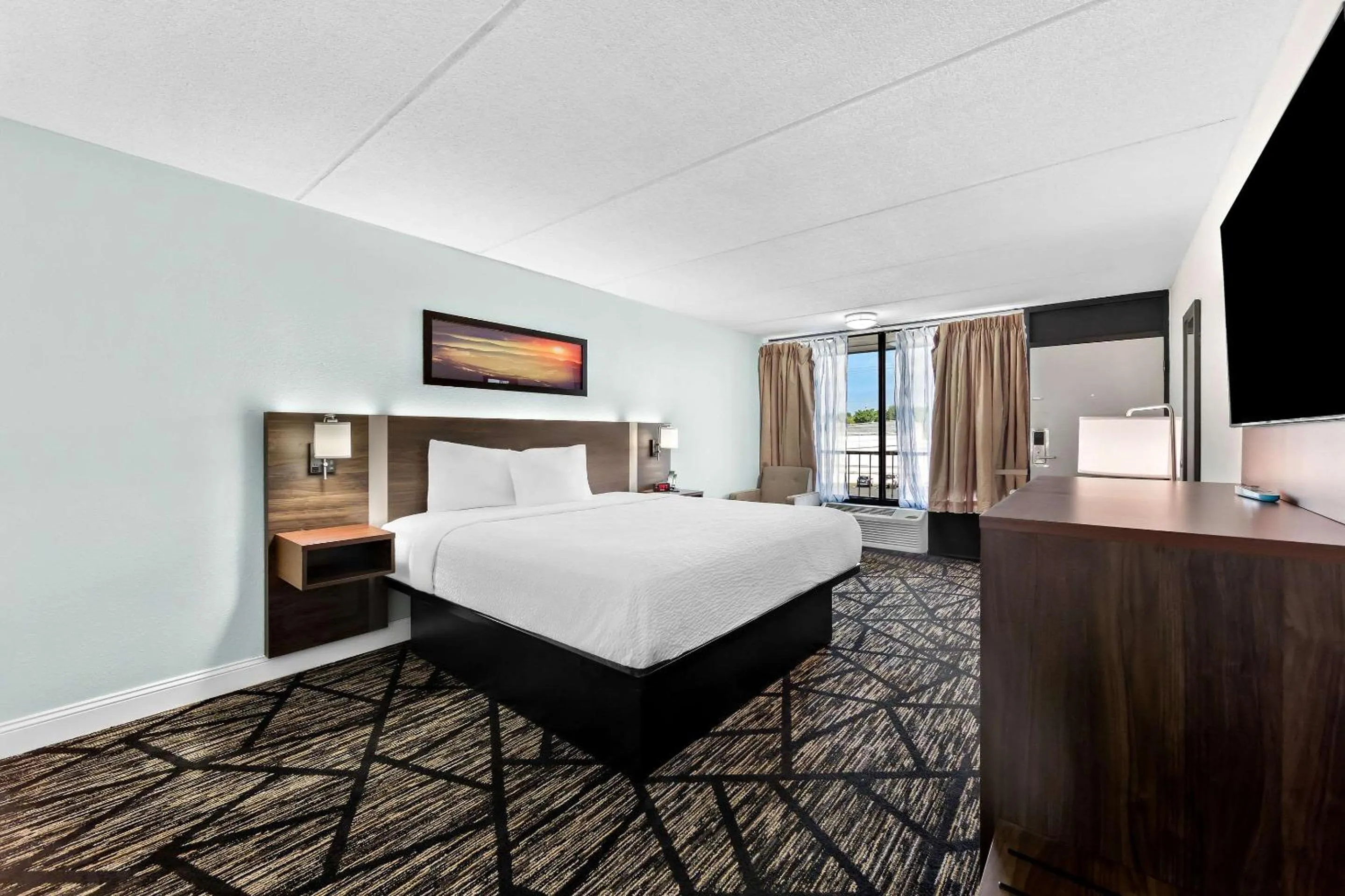 Bedroom, Bed in Clarion Inn & Suites near the Leconte Center Pigeon Forge