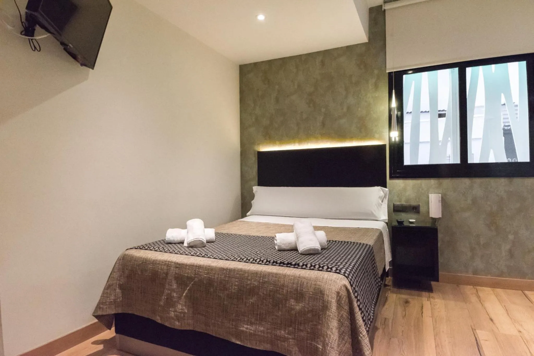 Bed in DAOS Suites & Terrace Marbella