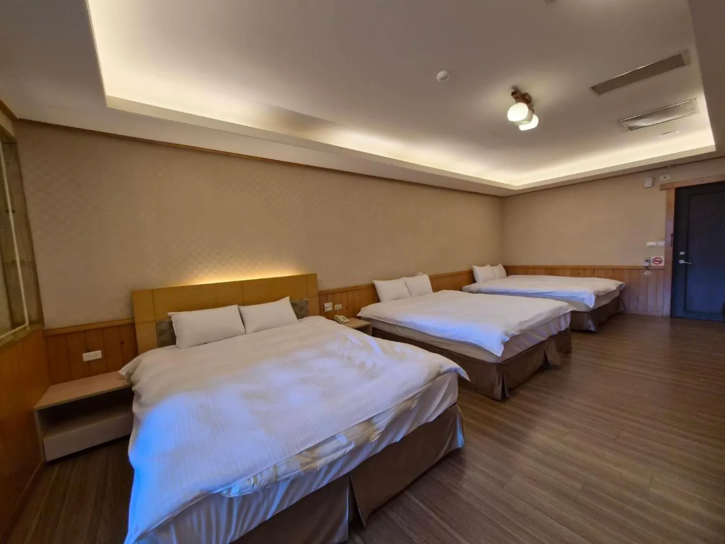 Bed in Dragon Manor Resort