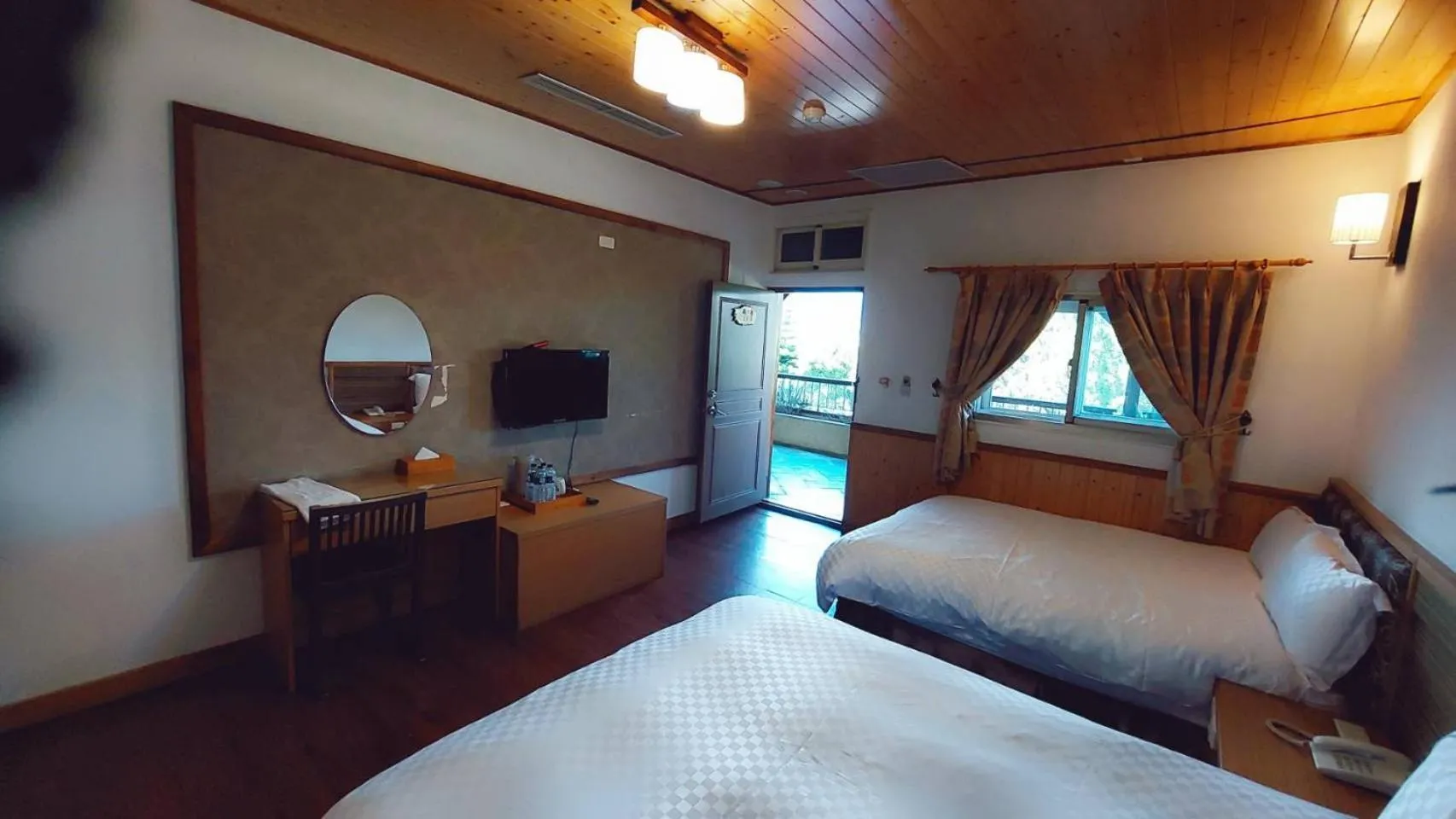 Bed in Dragon Manor Resort