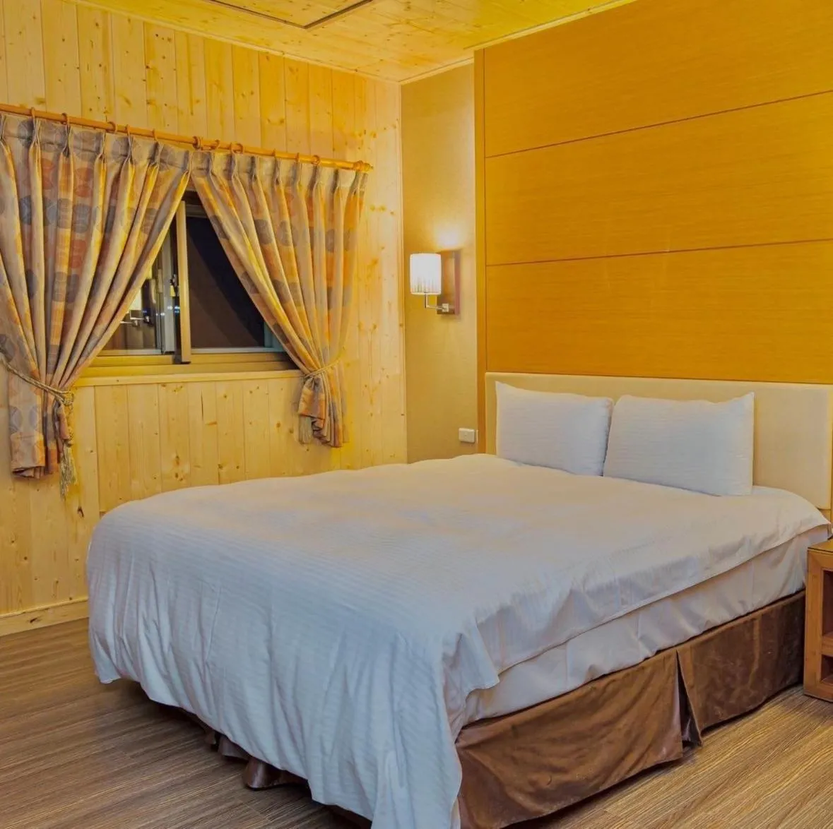 Bed in Dragon Manor Resort