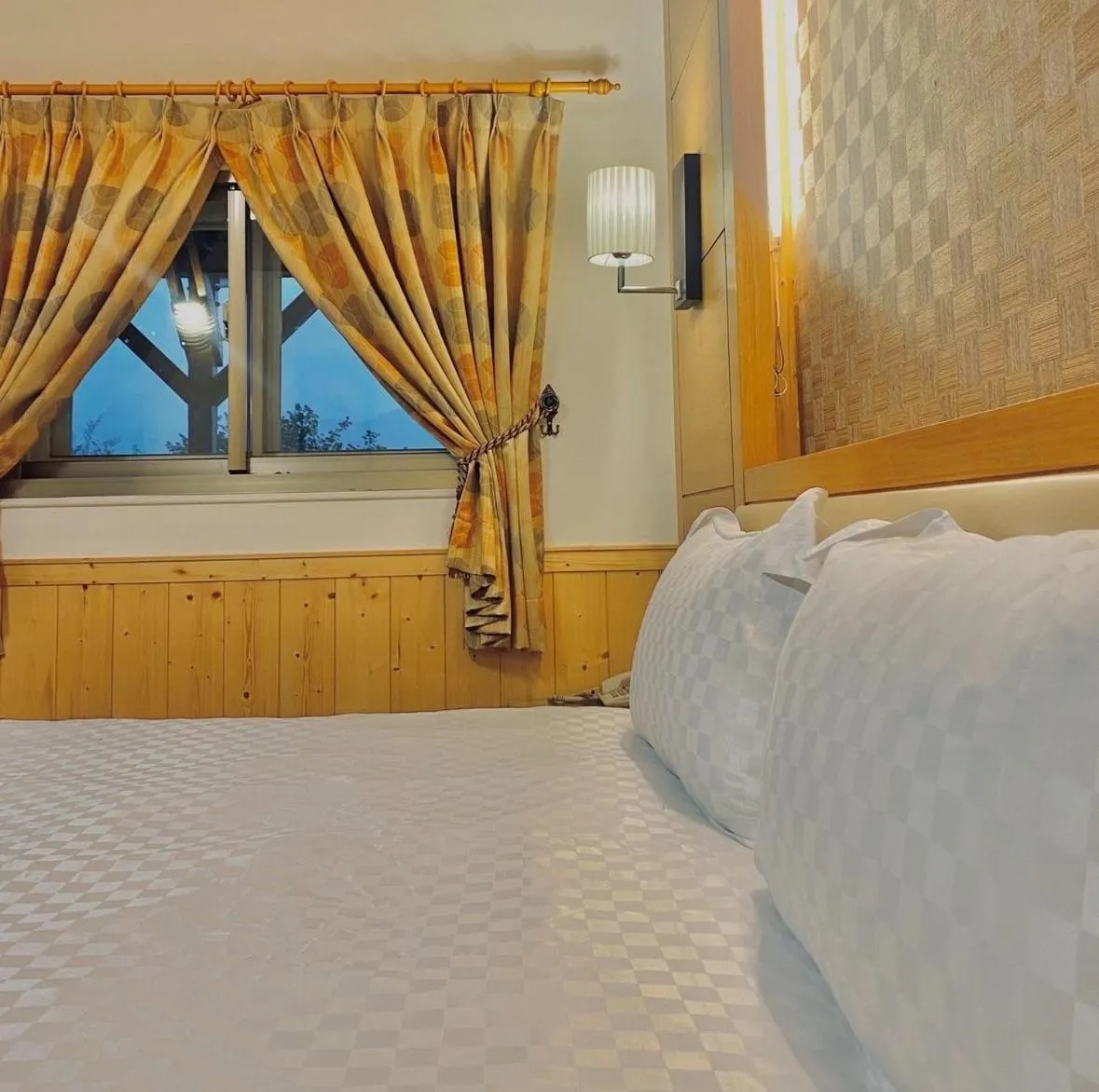 Bed in Dragon Manor Resort