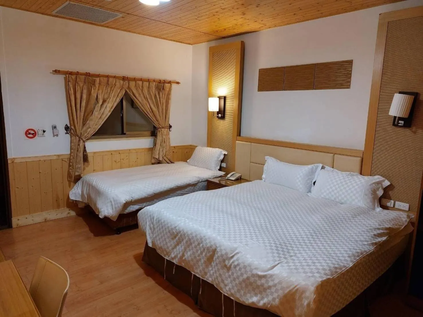 Bed in Dragon Manor Resort