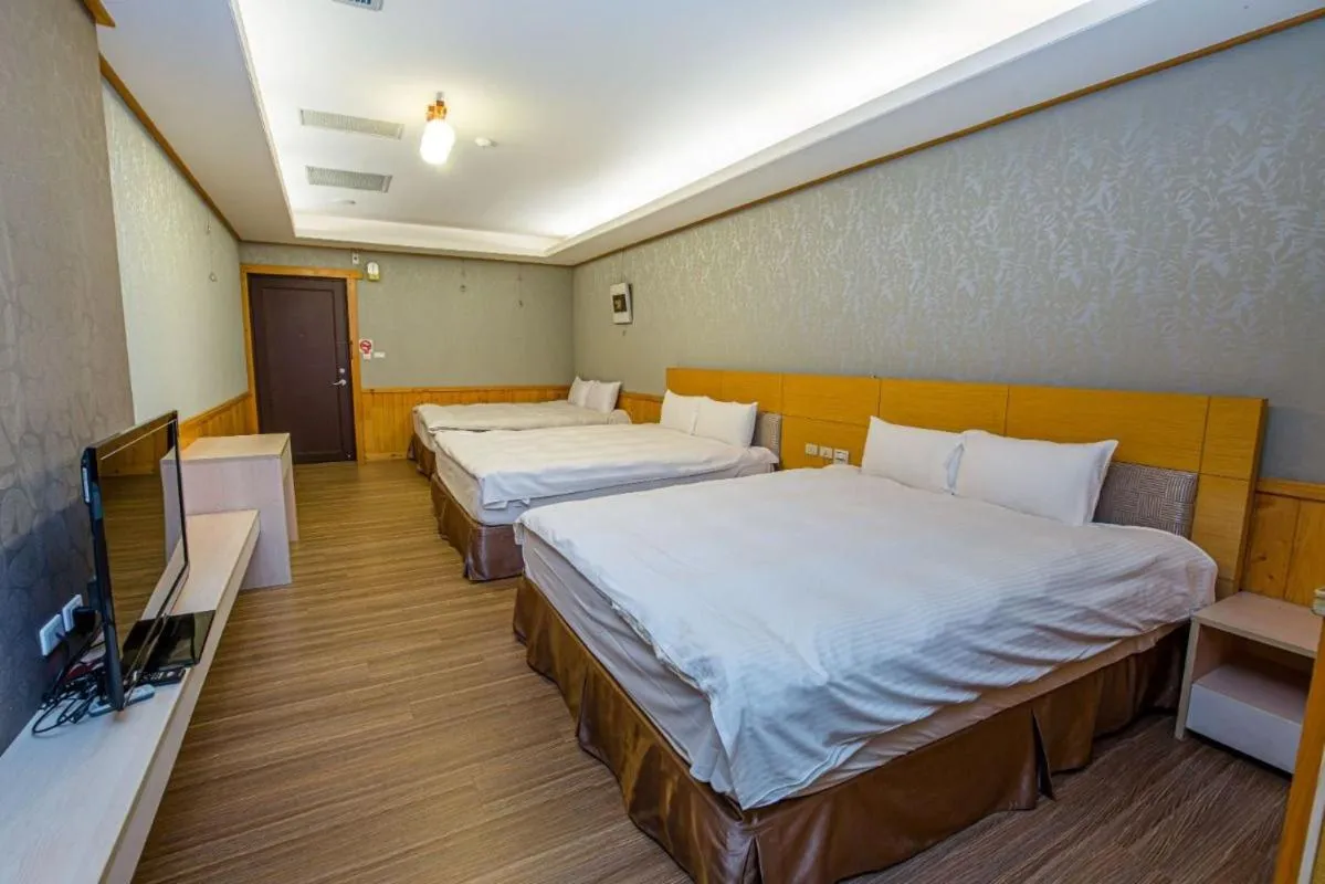 Bed in Dragon Manor Resort