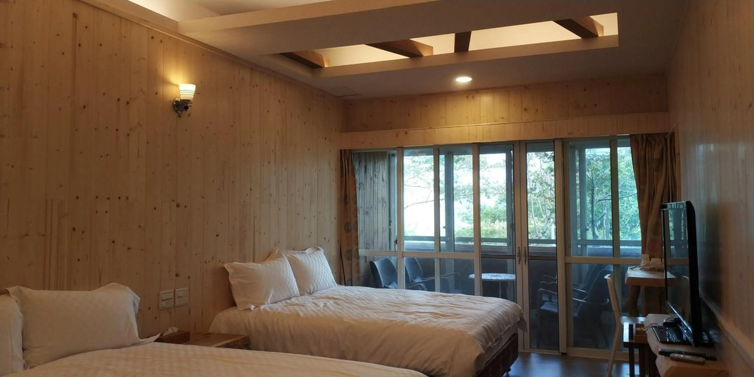 Bed in Dragon Manor Resort