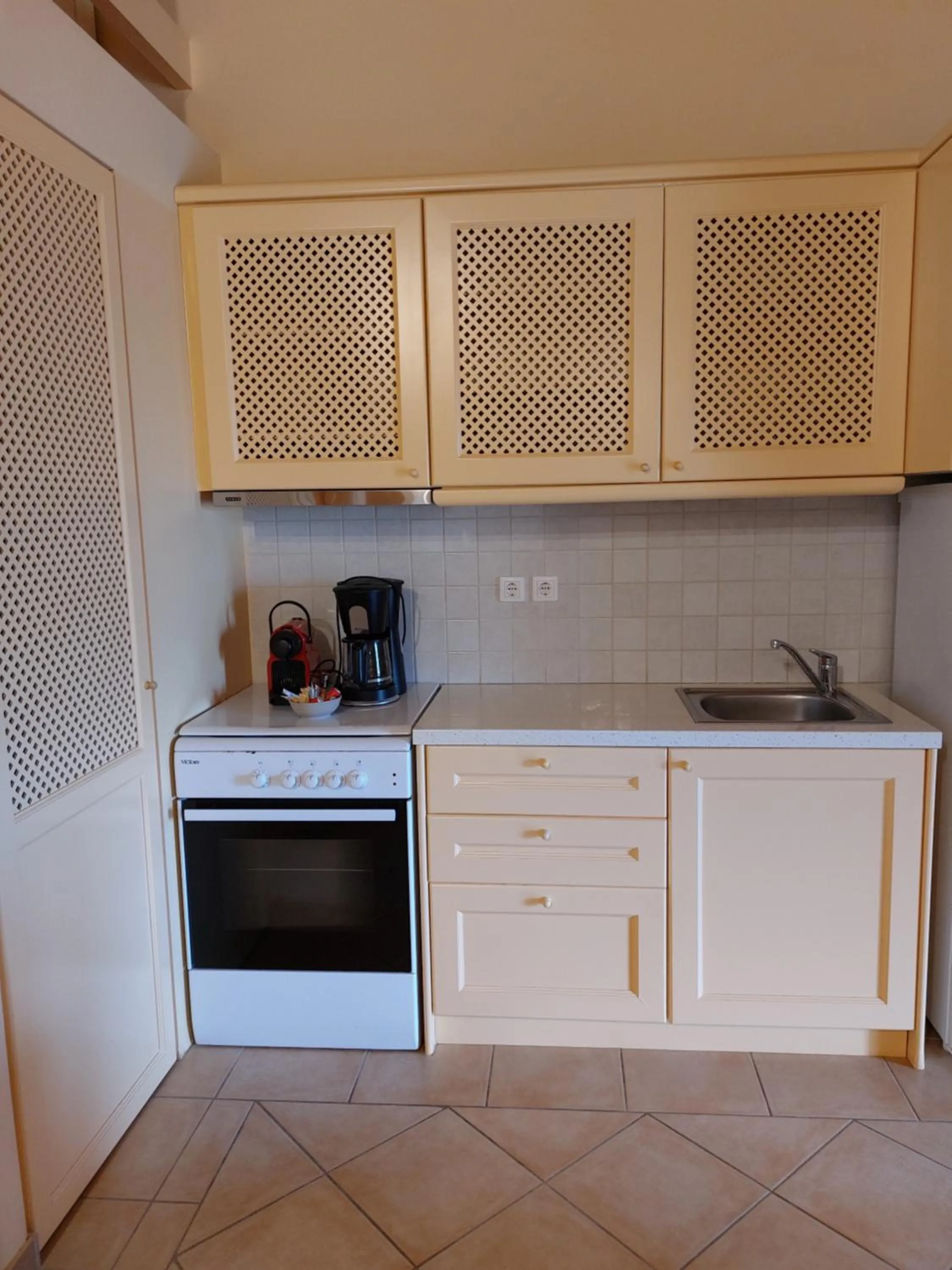 kitchen in PLEIADES lUXURY APARTMENTS