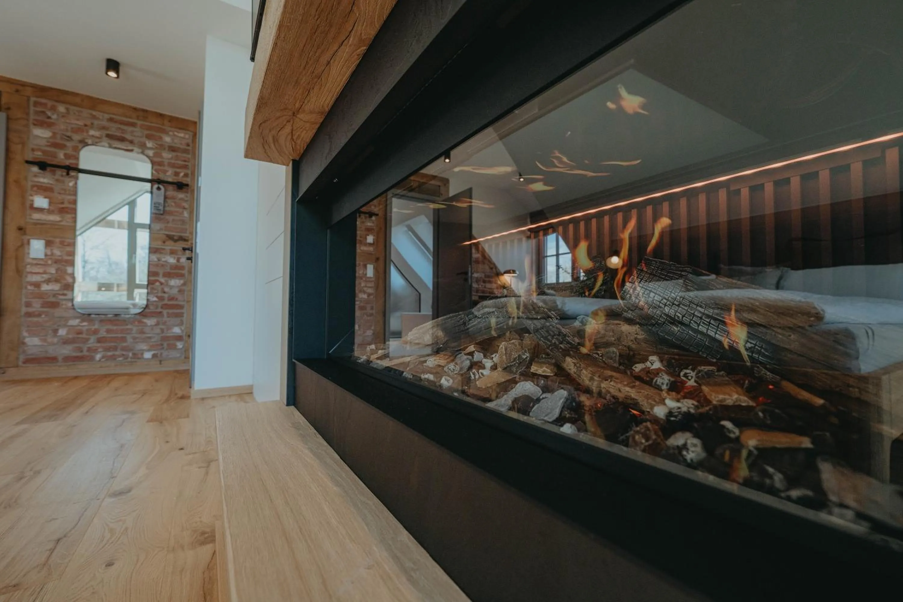 fireplace in Biohotel WildLand Natural Resort