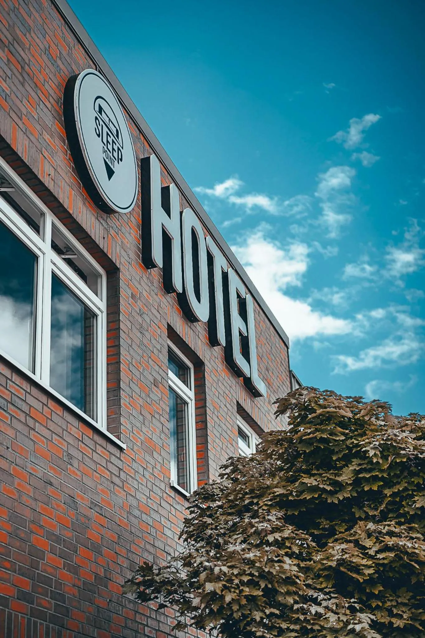 Property building in Sleep Point - Self Check in Hotel