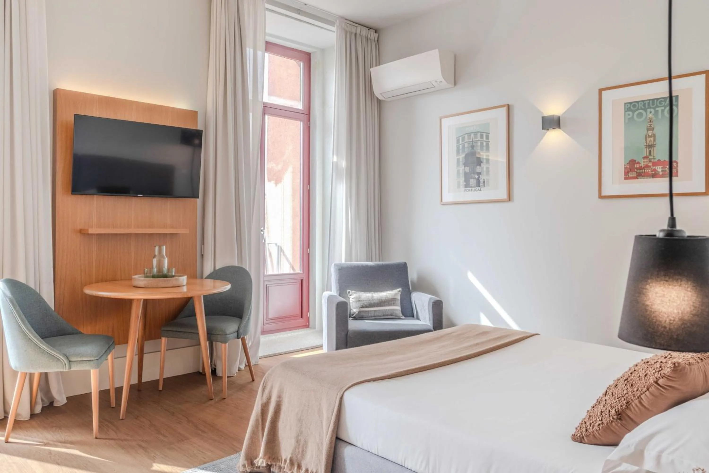 TV and multimedia, Bed in Uma Formosa Apartments