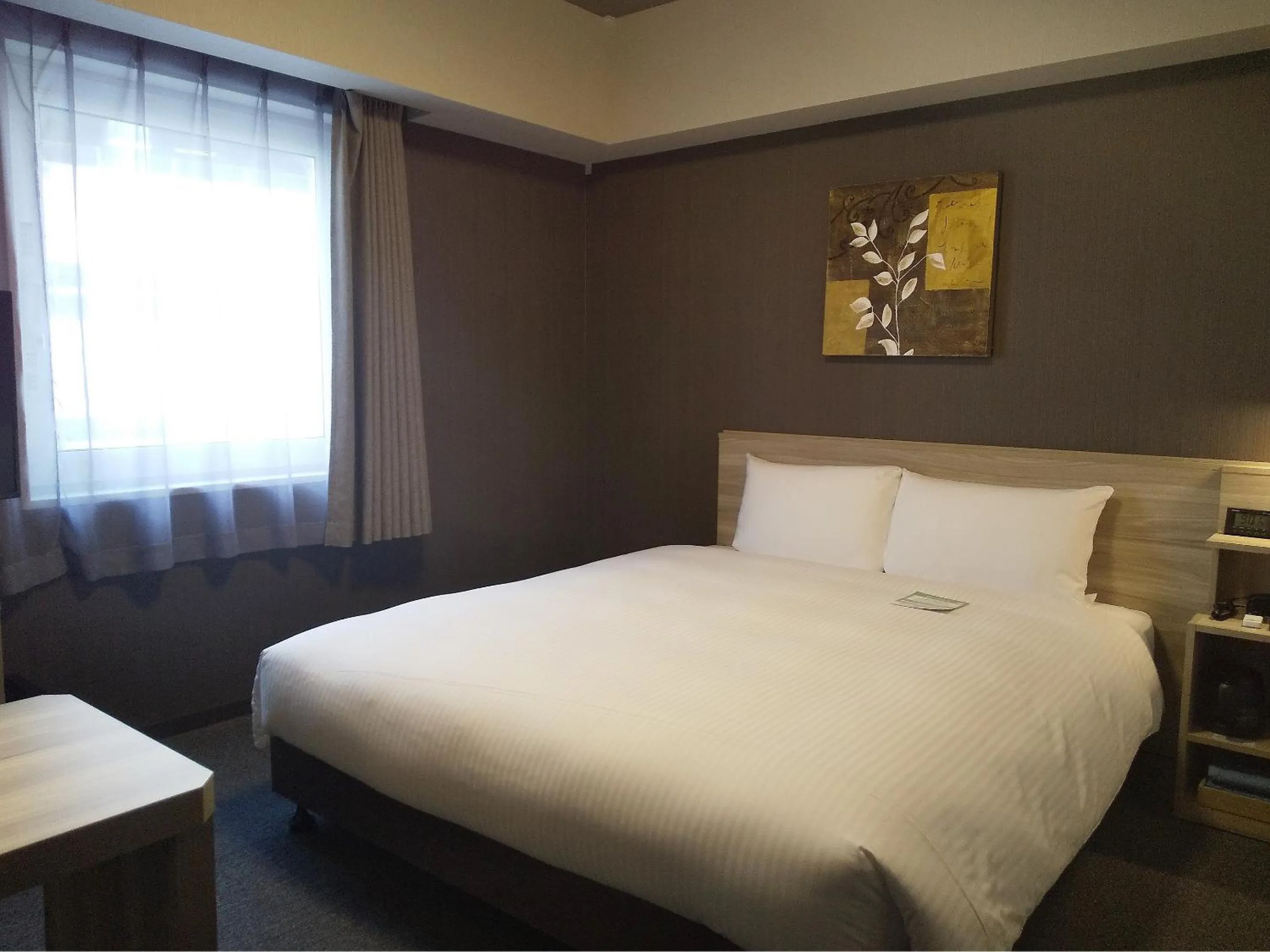 Photo of the whole room, Bed in Hotel Route-Inn Mihara Ekimae