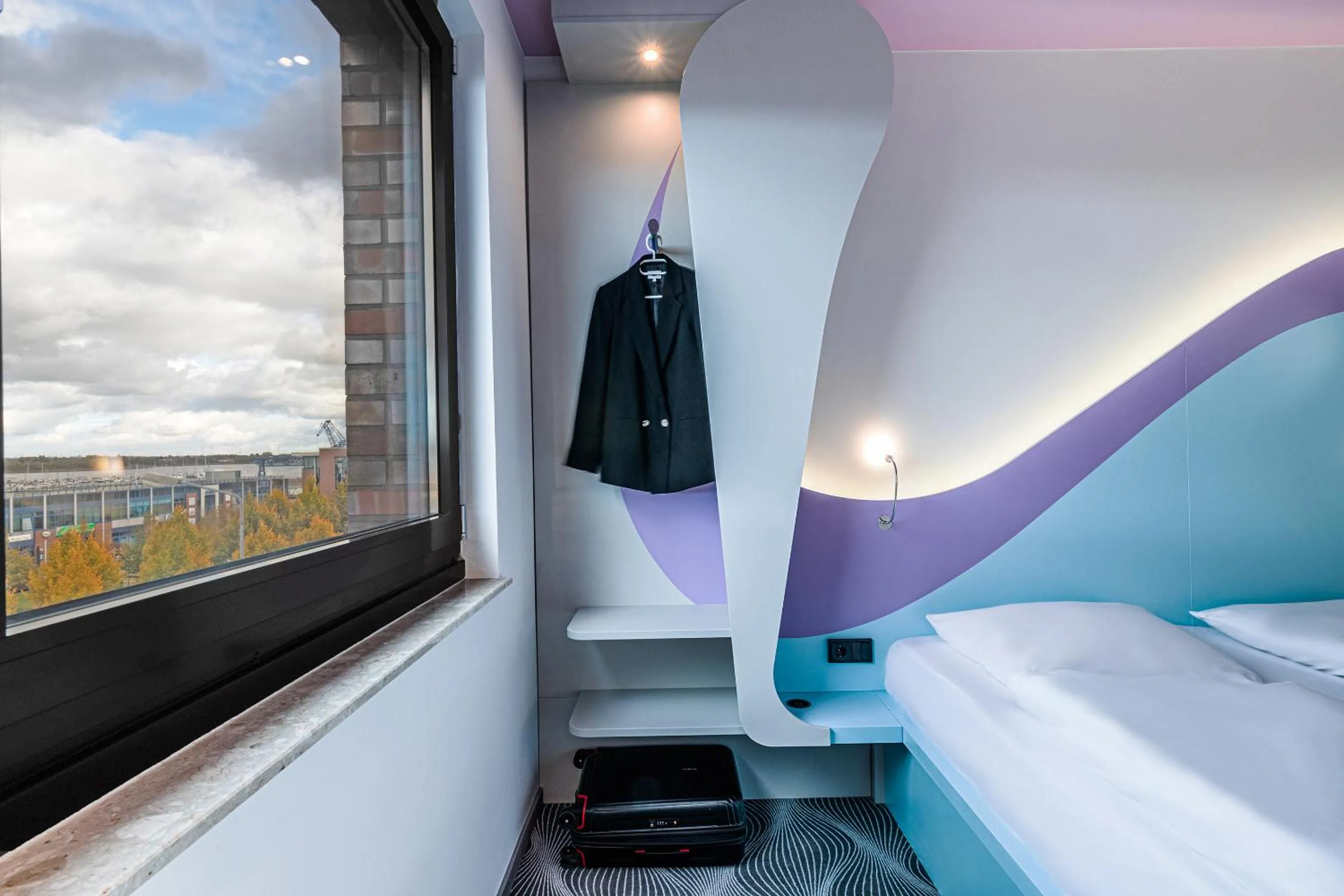 Photo of the whole room, Bed in Prize by Radisson, Rostock City