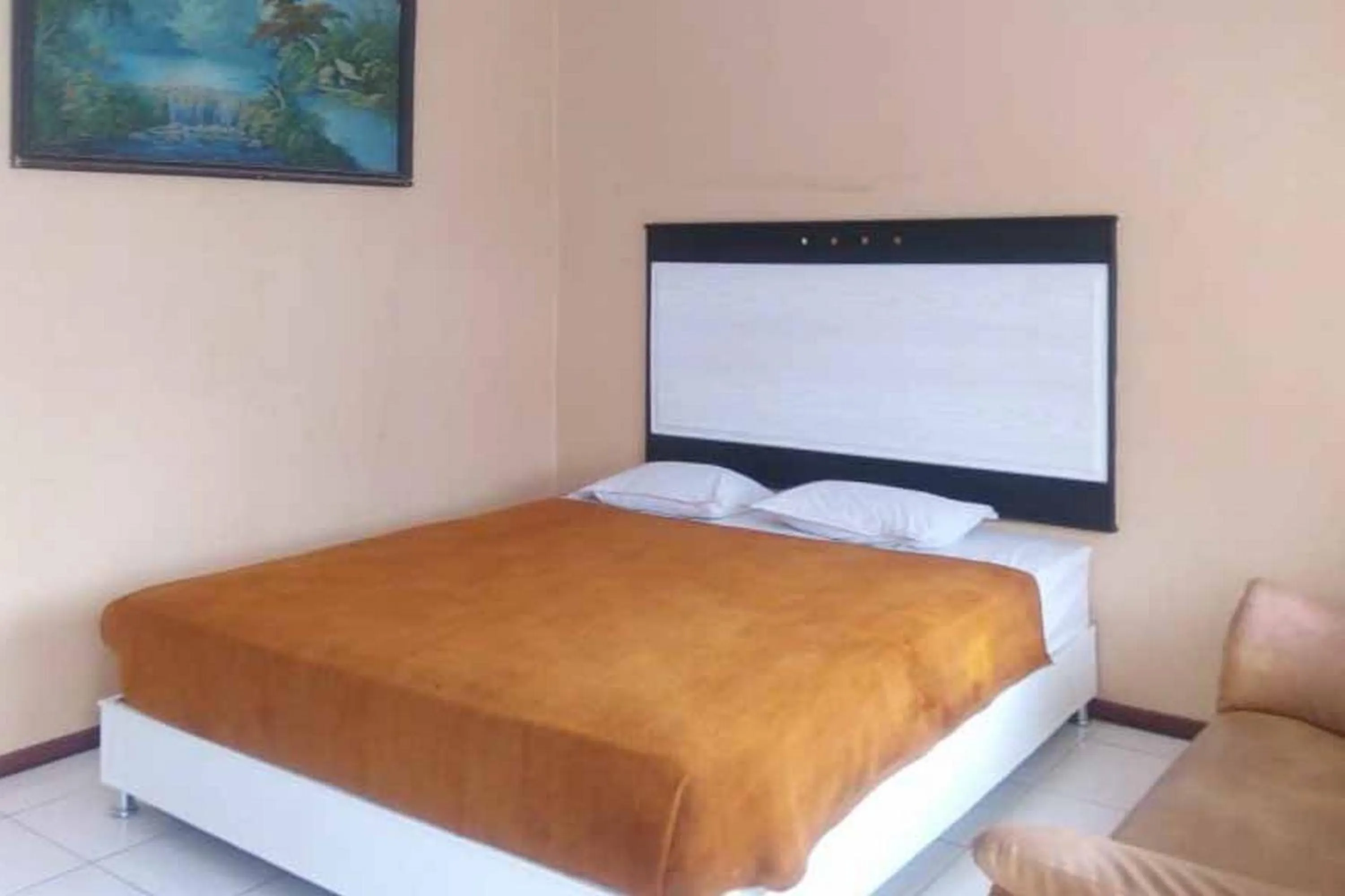 Bed in RedDoorz Syariah @ Hotel Kencana Tasikmalaya