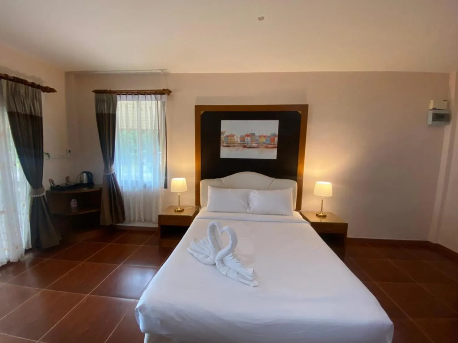 Bed in Chaithalay Khanom Resort