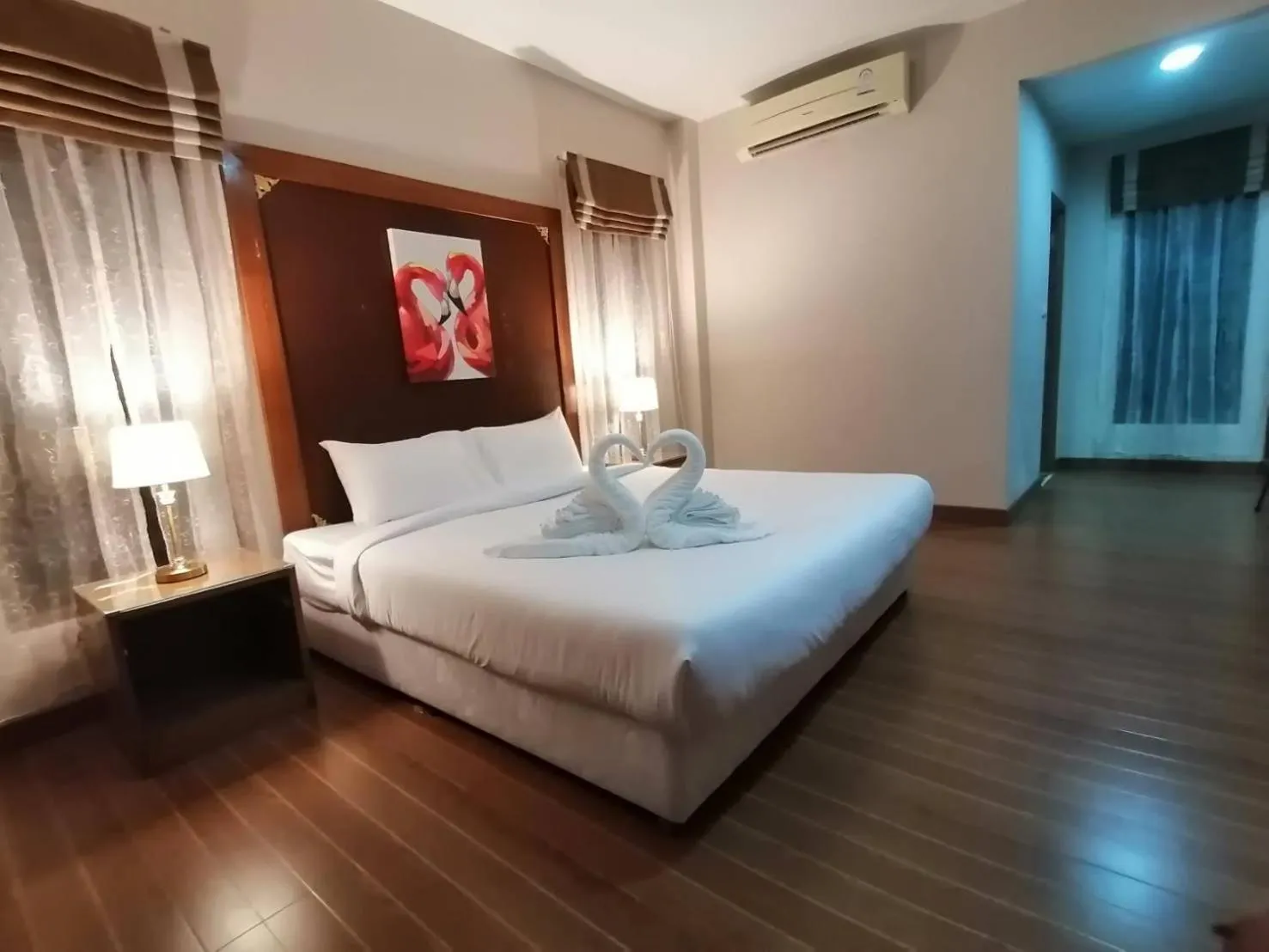 Bed in Chaithalay Khanom Resort