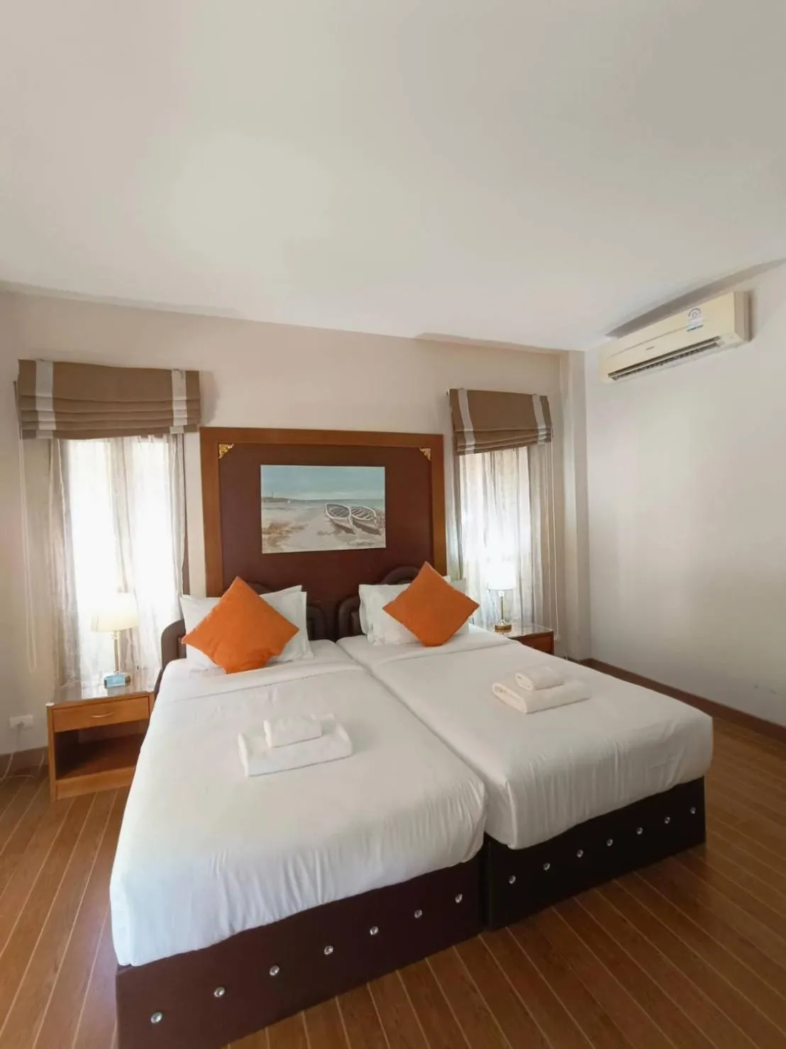 Bed in Chaithalay Khanom Resort