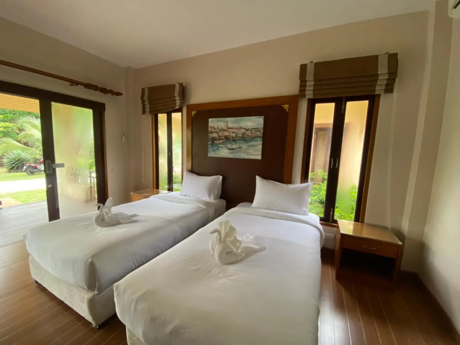 Bed in Chaithalay Khanom Resort