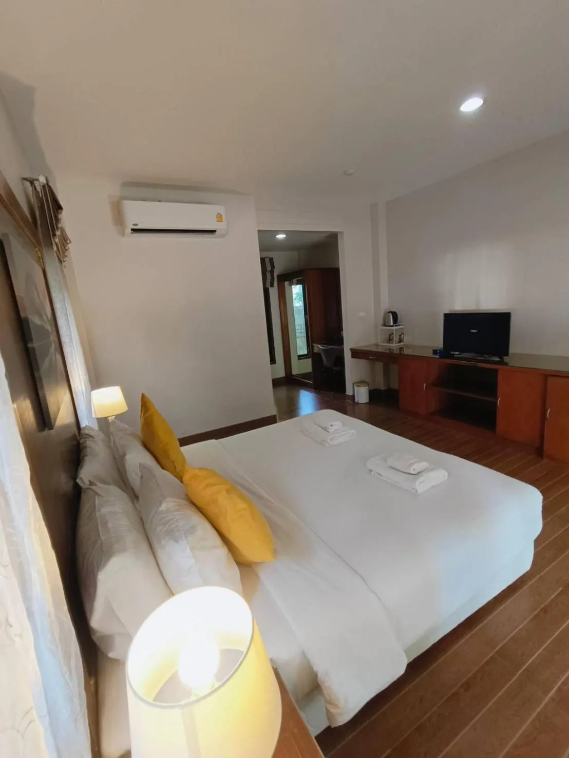 Bed in Chaithalay Khanom Resort