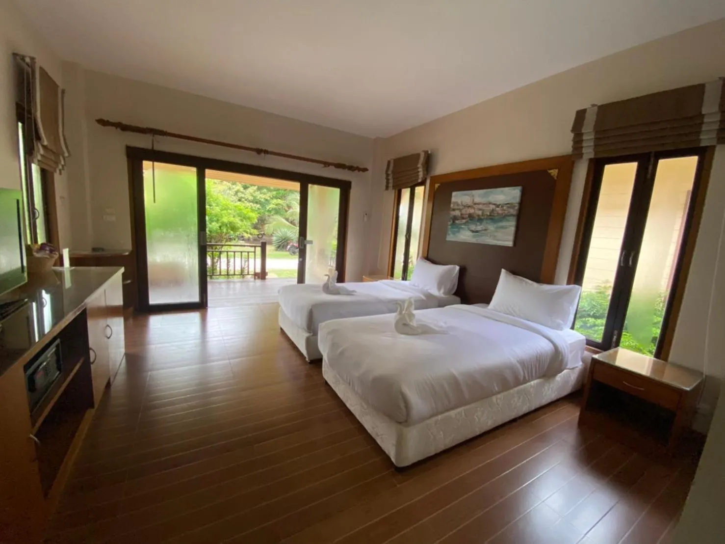 Bed in Chaithalay Khanom Resort