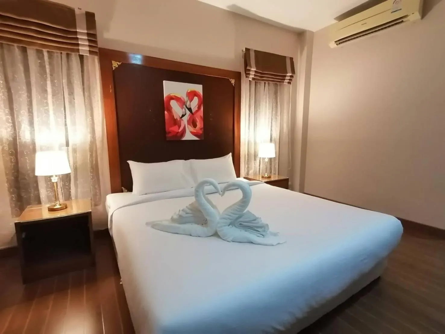 Bed in Chaithalay Khanom Resort