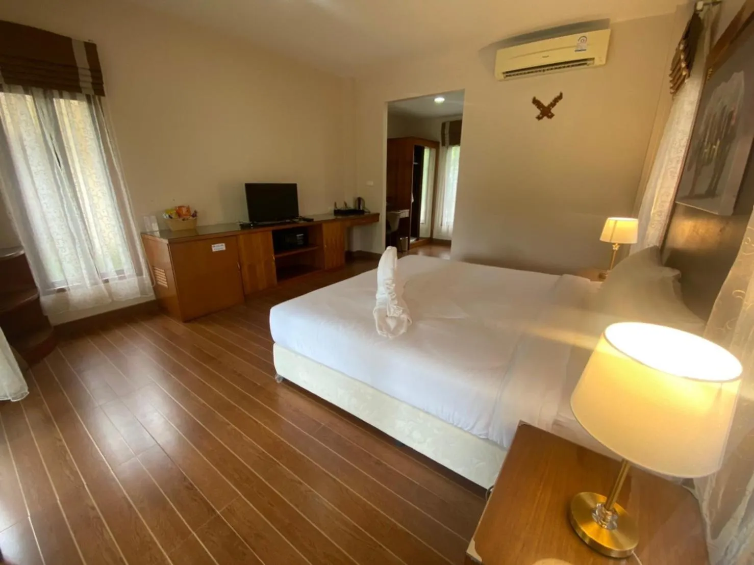 Bed in Chaithalay Khanom Resort