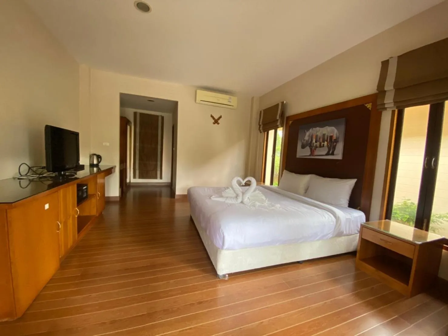 Bed in Chaithalay Khanom Resort