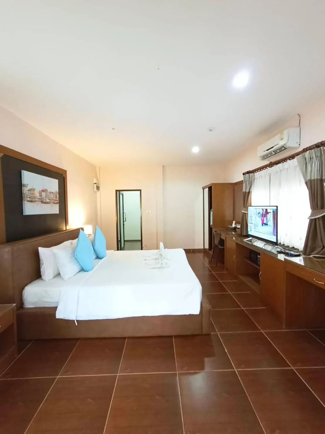 Bed in Chaithalay Khanom Resort