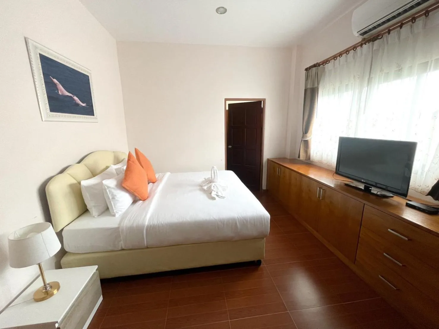 Bed in Chaithalay Khanom Resort