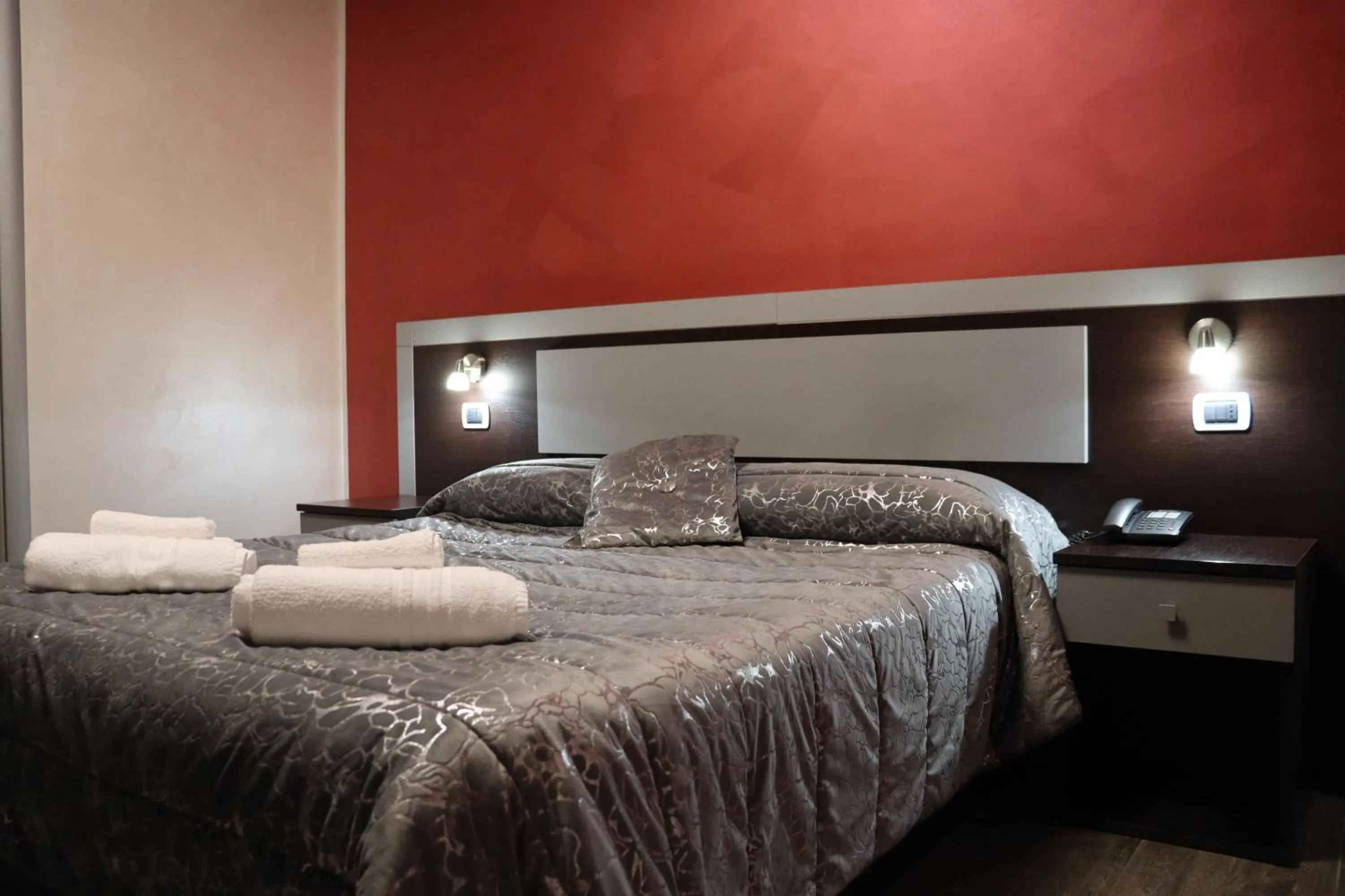 Bed in Hotel Paradiso