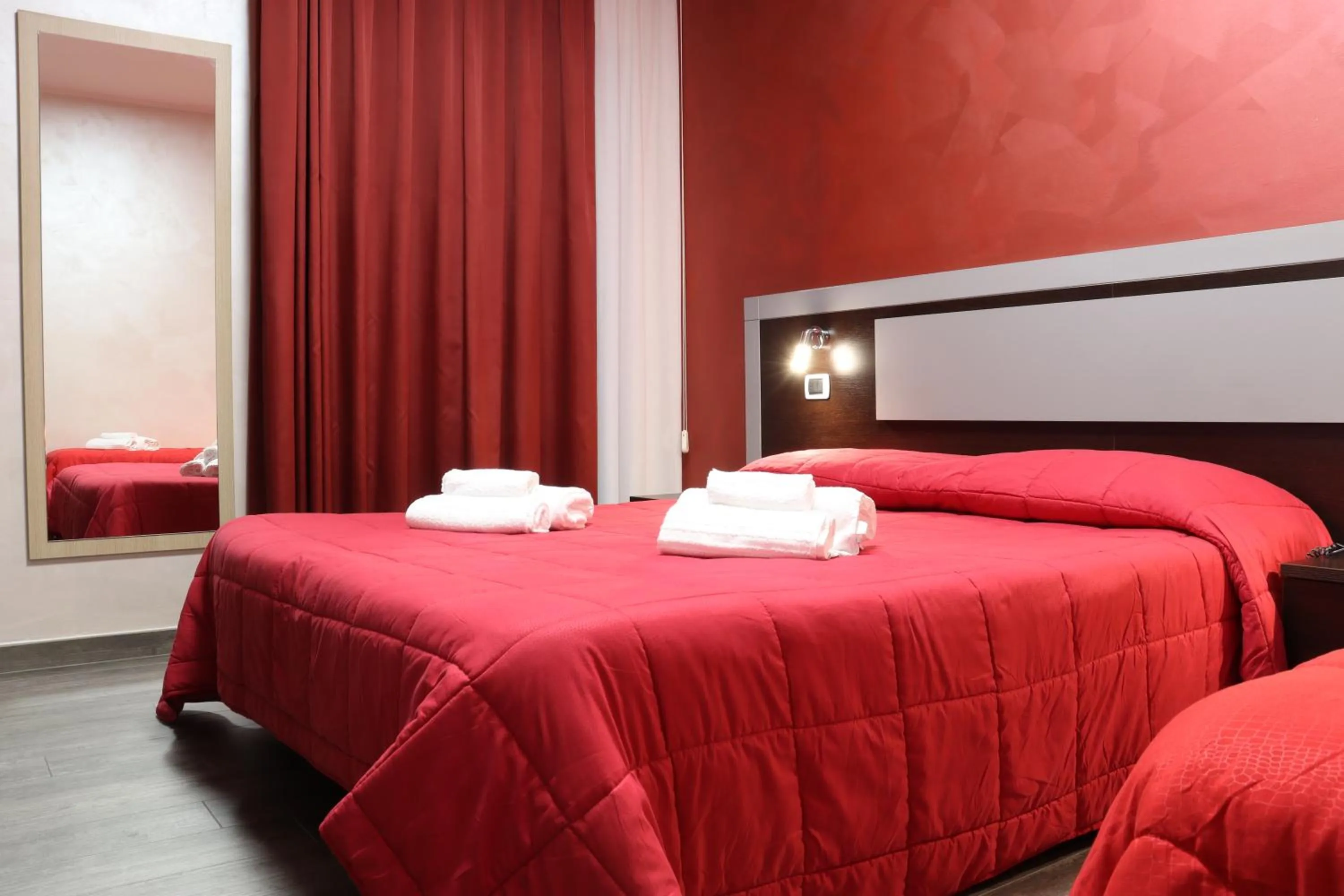 Bed in Hotel Paradiso