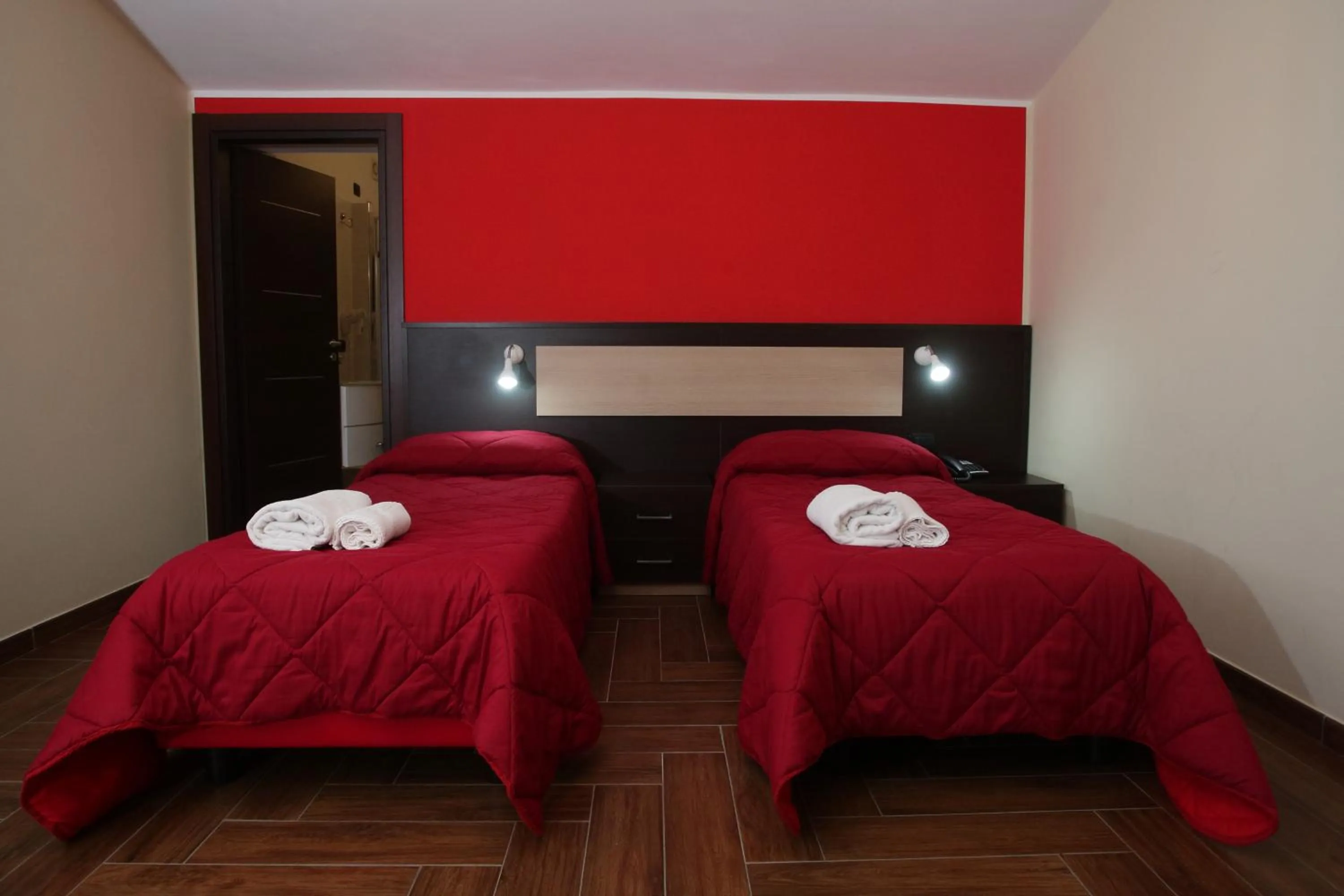 Bed in Hotel Paradiso