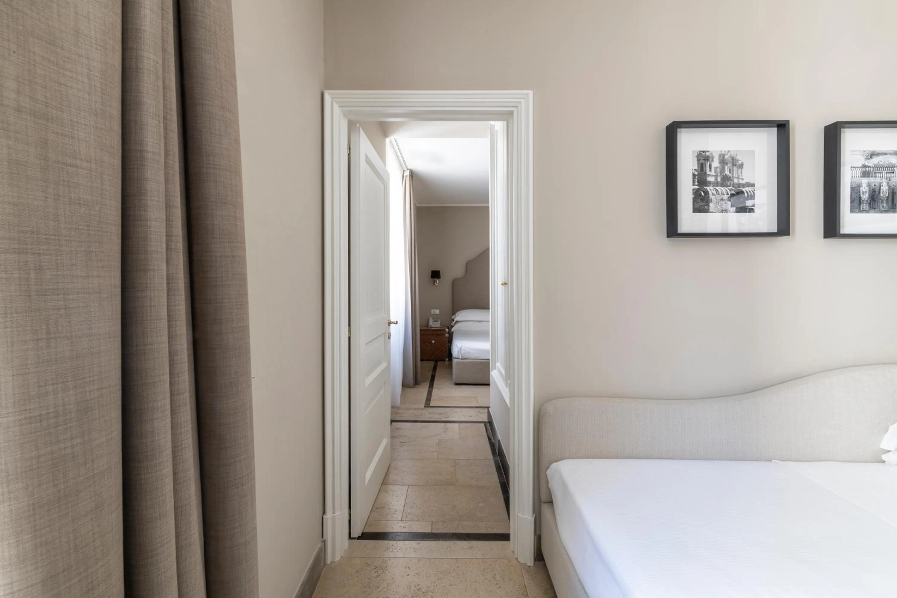 Bed in La Dépendance Hotel