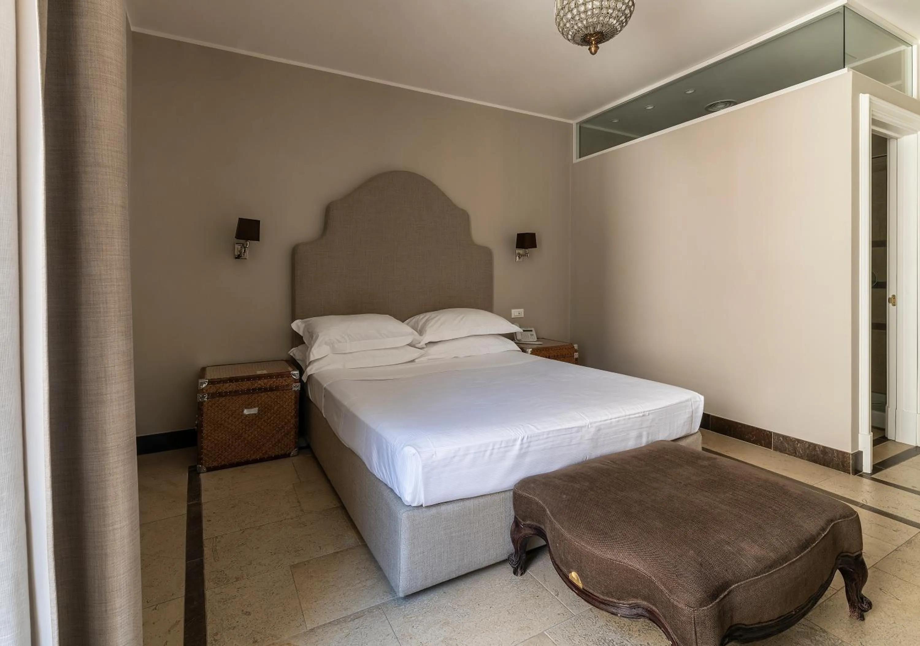 Bed in La Dépendance Hotel