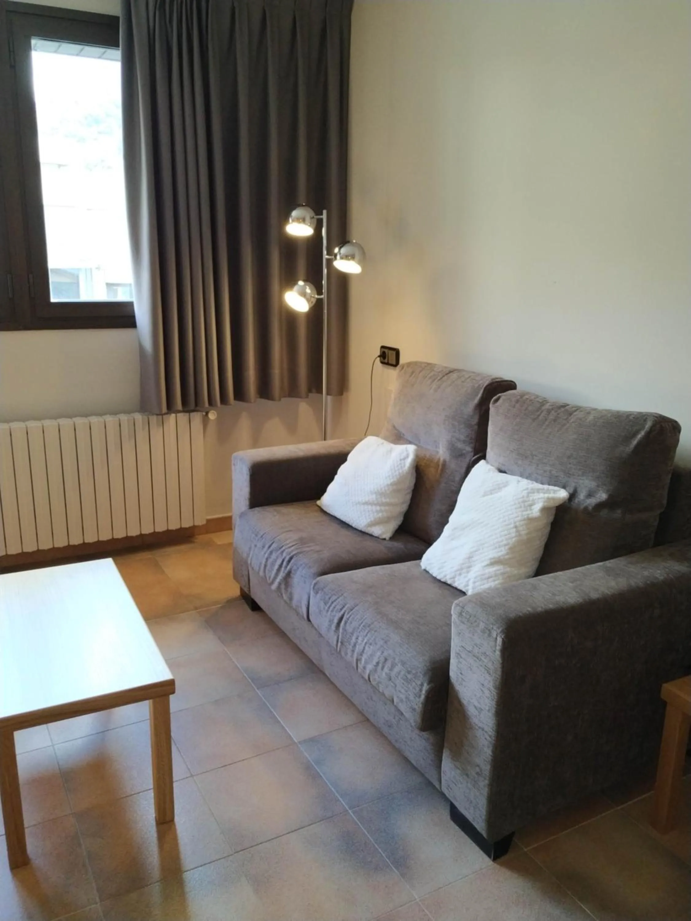 Living room in Aparthotel El Serch