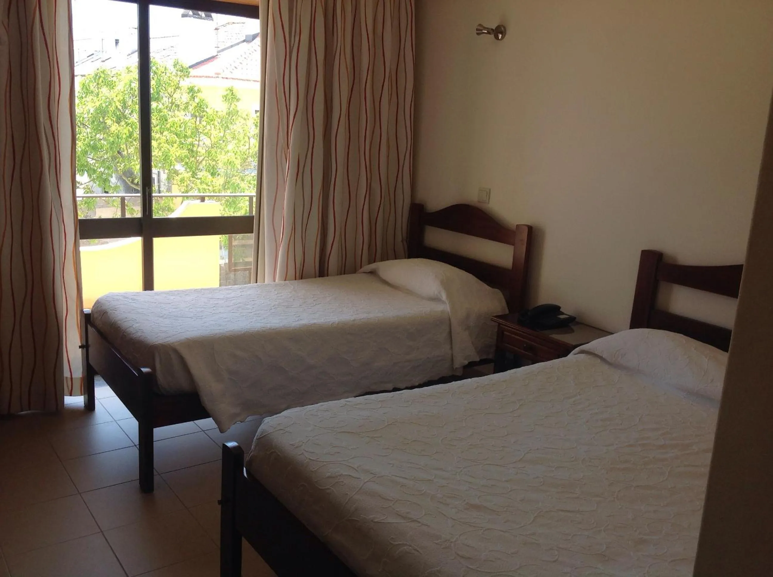 View (from property/room), Bed in Ribeiro Hotel