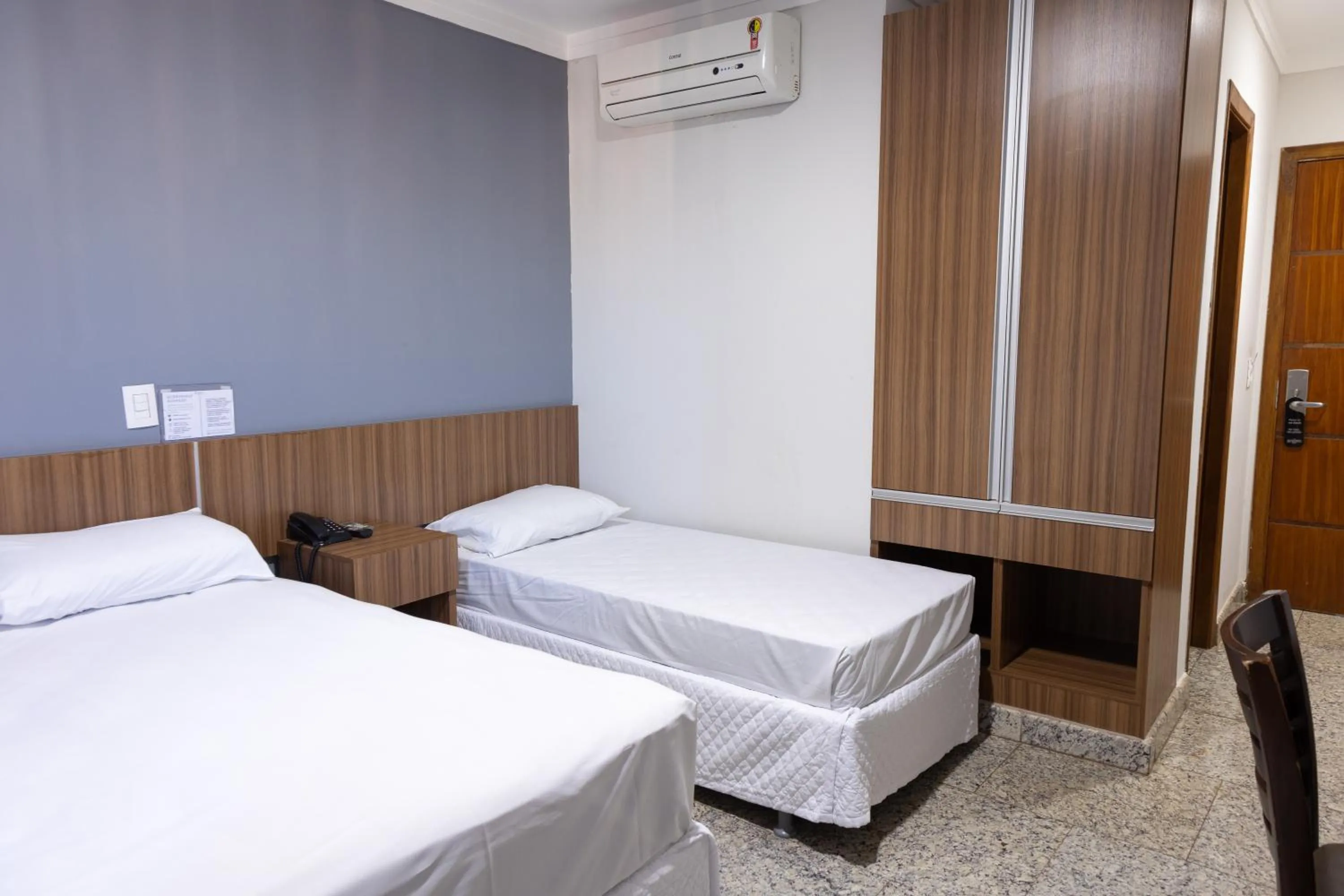 Bed in BOMBONATO PALACE HOTEL