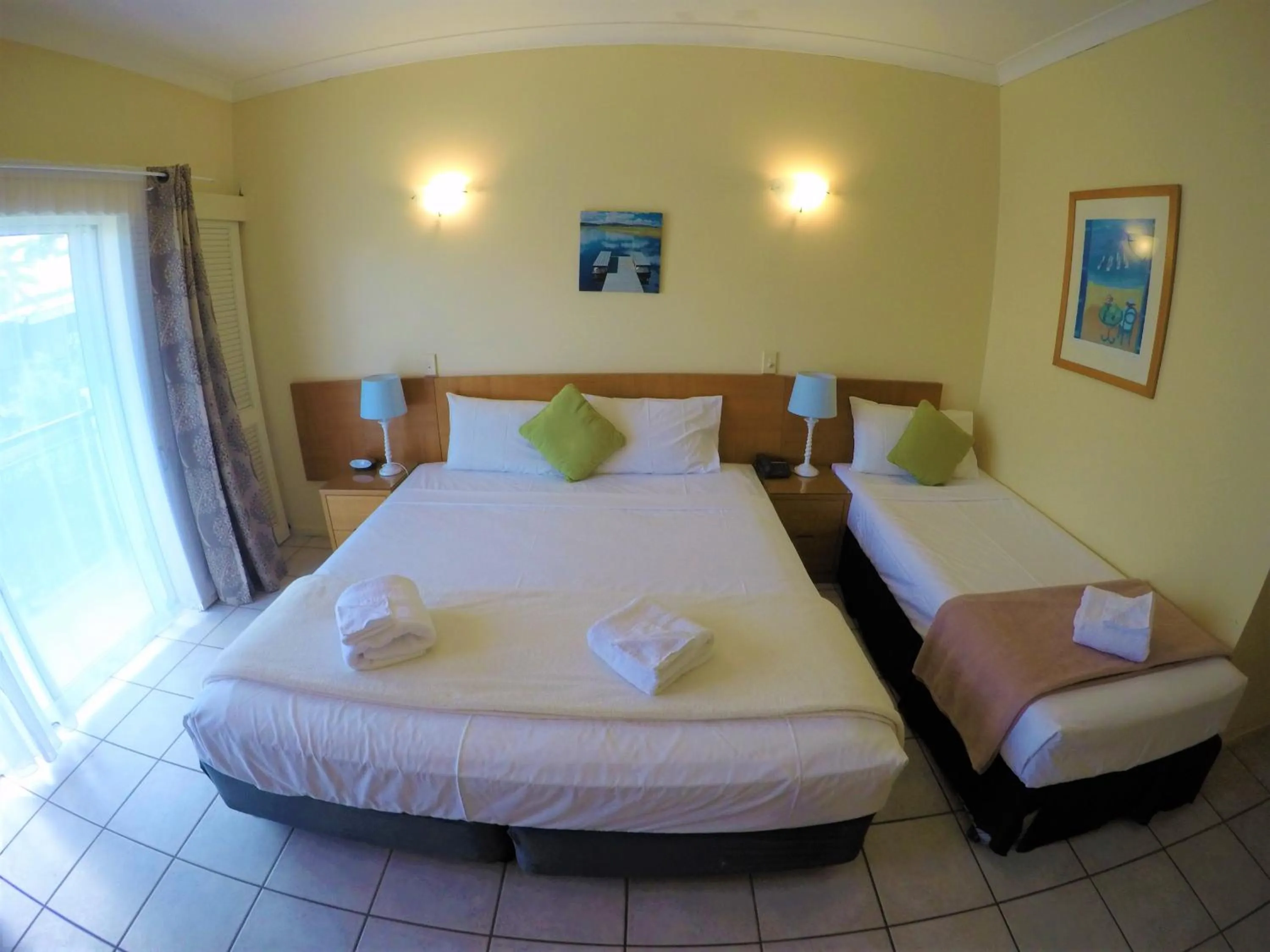 Bed in Crystal Garden Resort & Restaurant