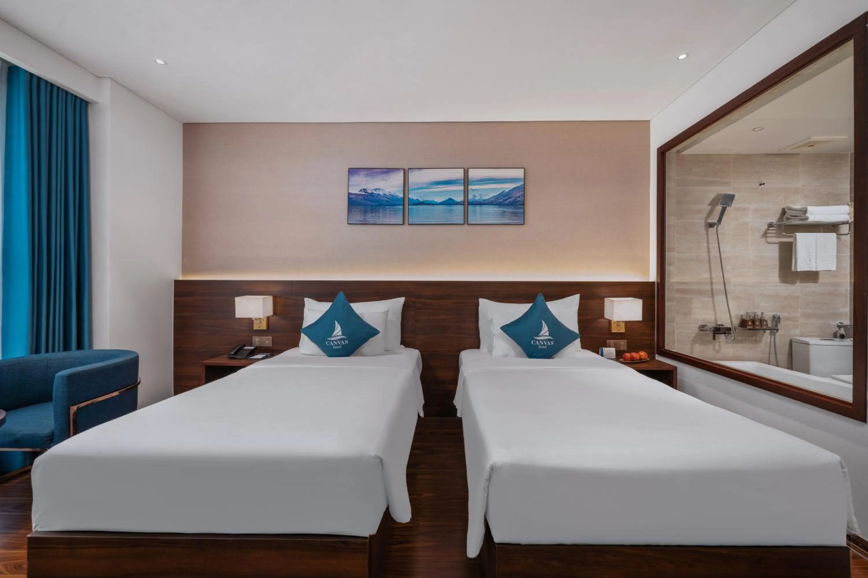 Bed in Canvas Danang Beach Hotel