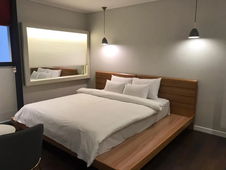 Bed in Sinan Equelim Hotel