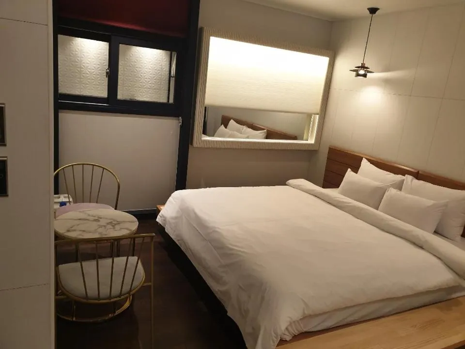 Bed in Sinan Equelim Hotel