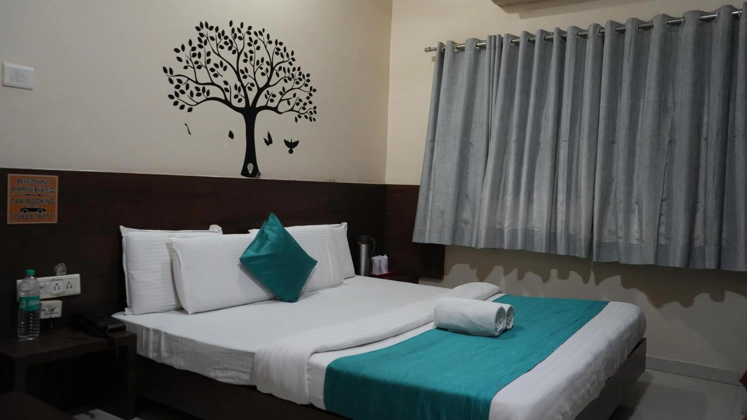 Bedroom, Bed in Hotel Satyug