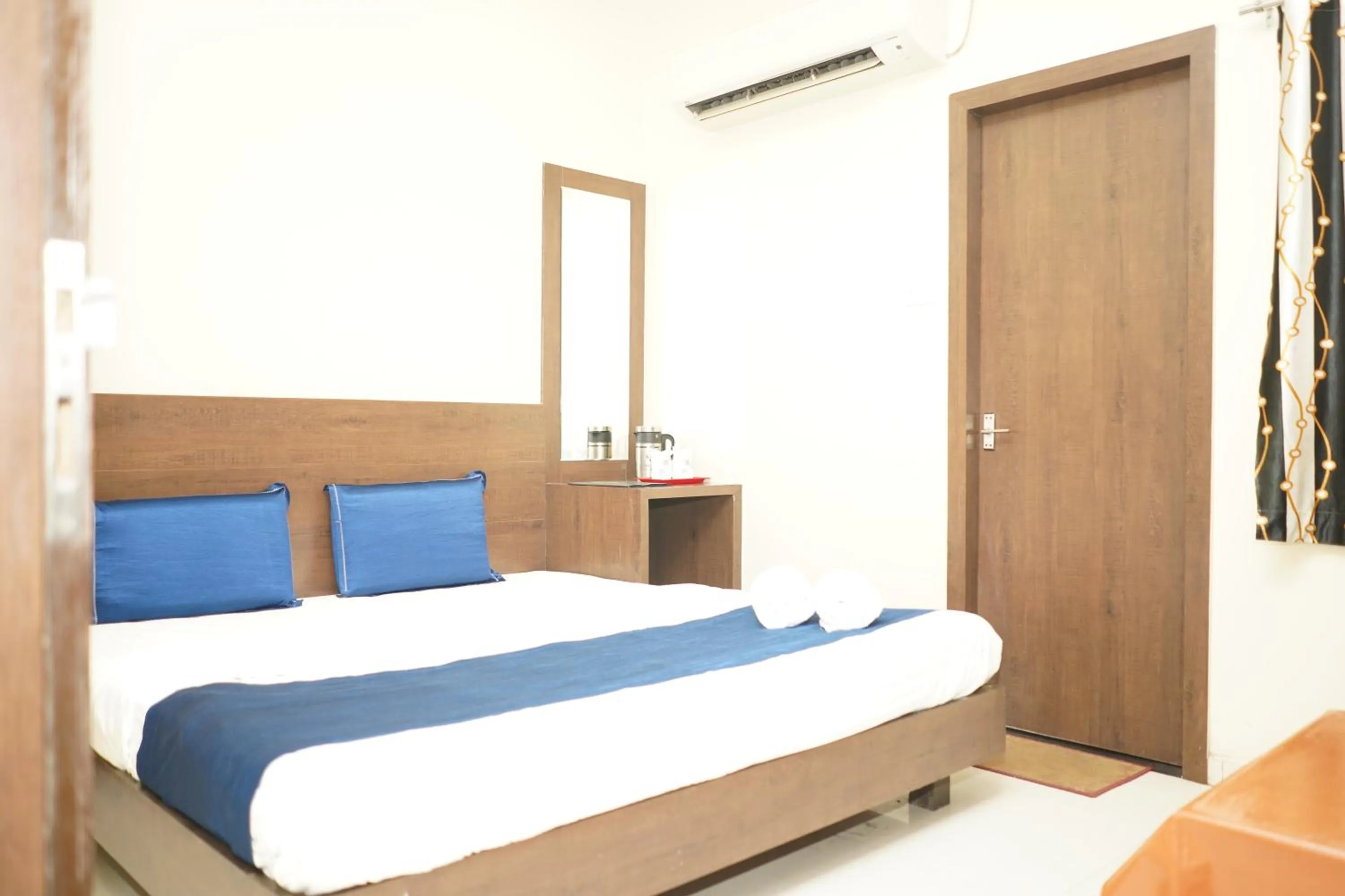 Bedroom, Bed in Hotel Satyug