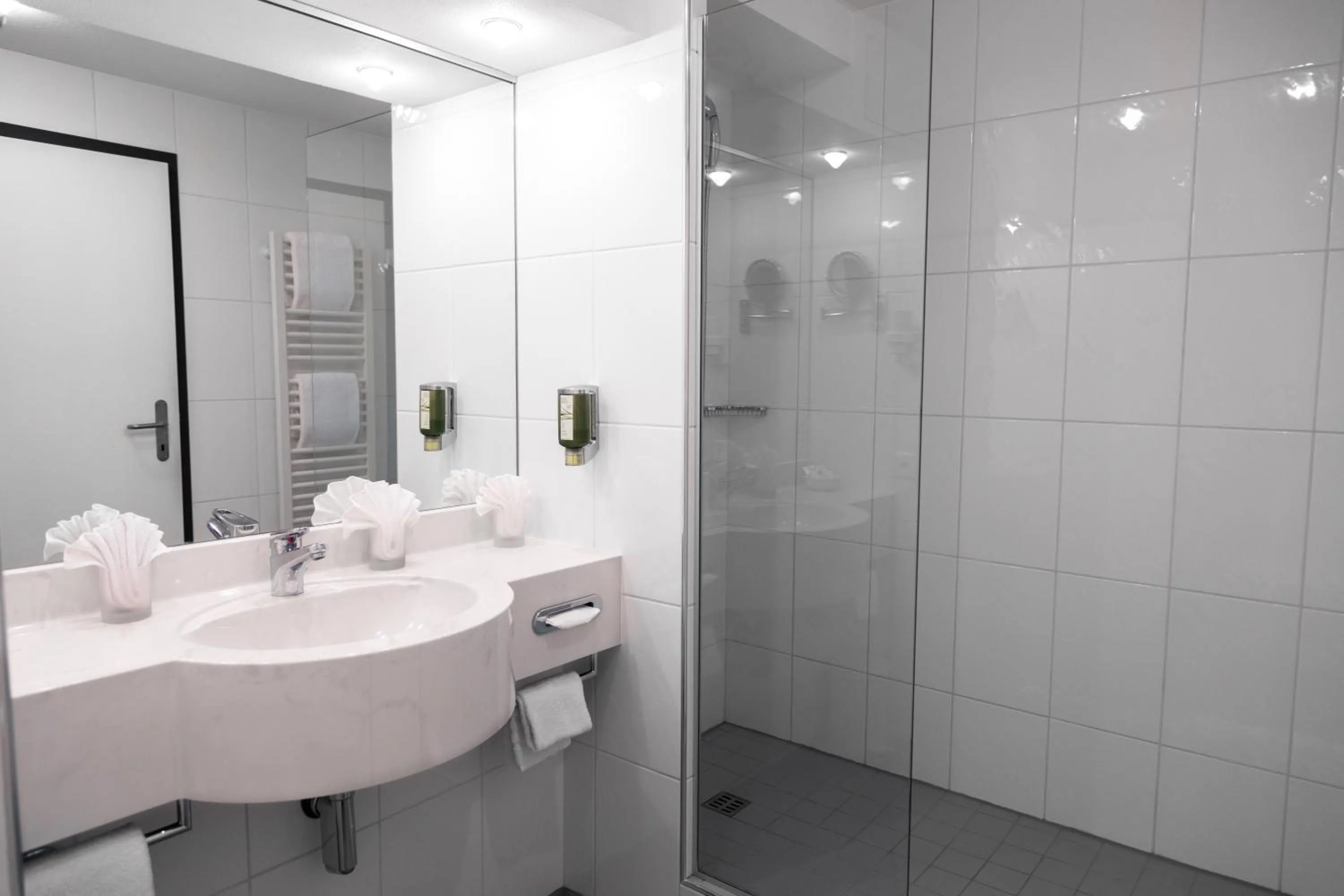 Bathroom in HOTEL ENGEL LIESTAL - Business & Lifestyle
