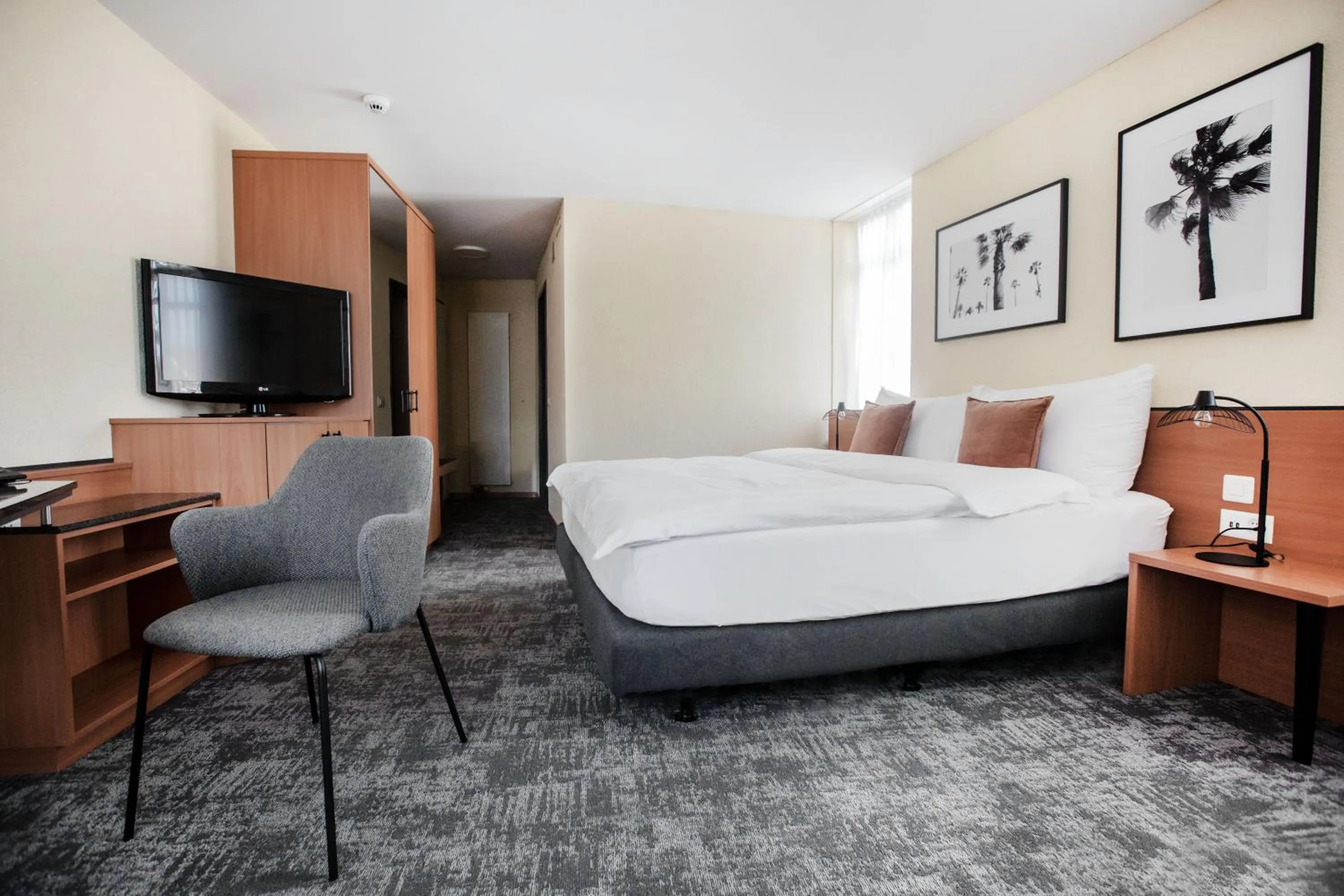 Bedroom, Bed in HOTEL ENGEL LIESTAL - Business & Lifestyle