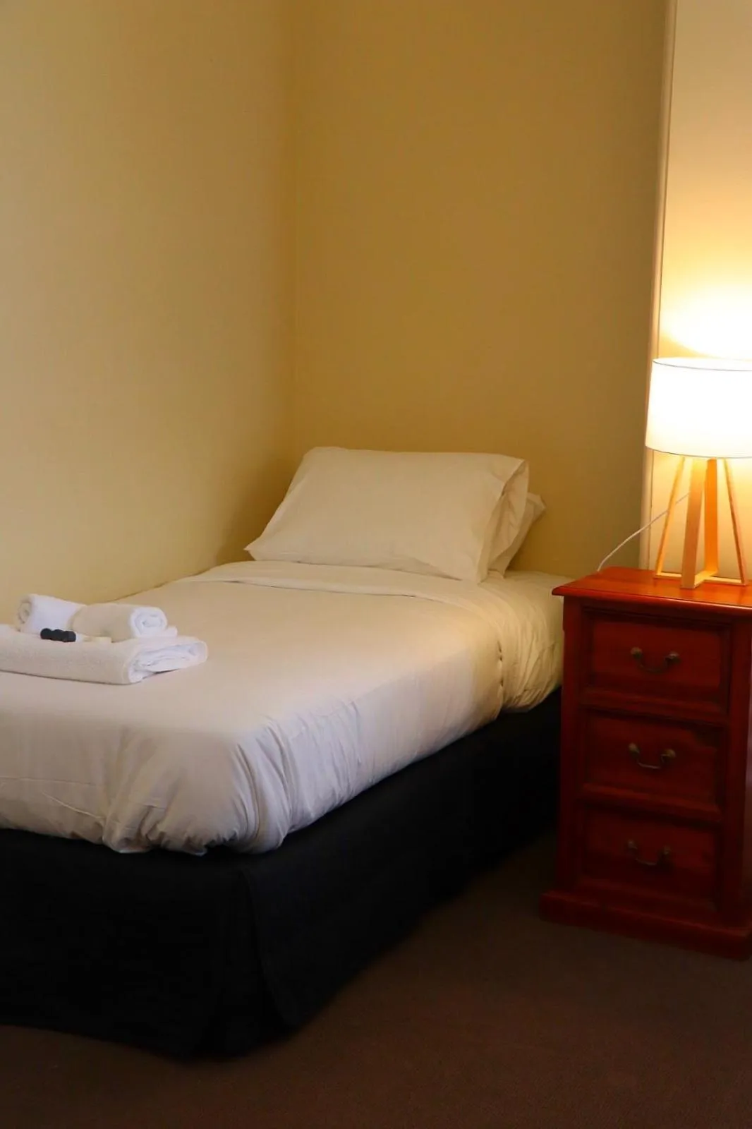 Bed in Palace Hotel Mortlake Sydney