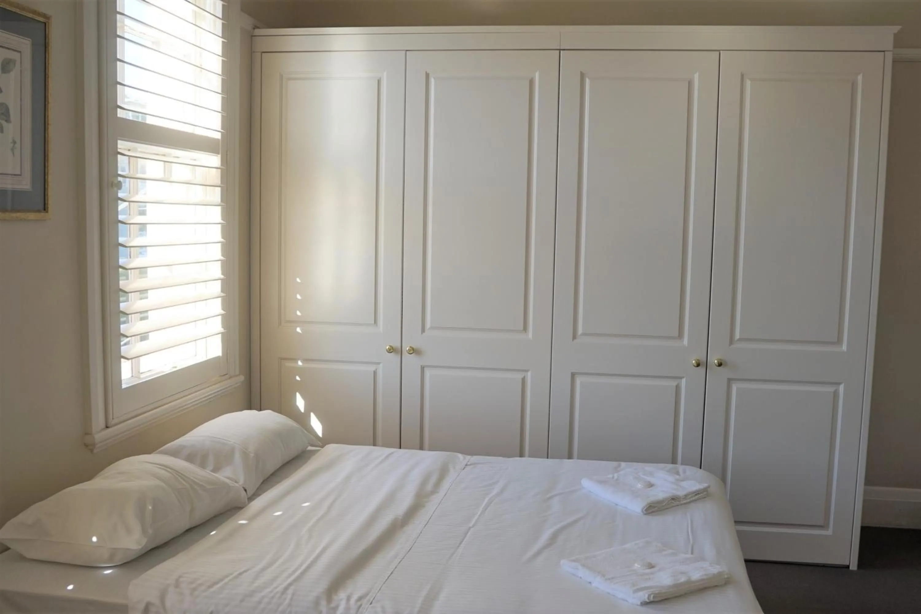 Bed in Palace Hotel Mortlake Sydney