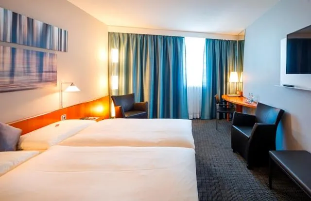 Photo of the whole room, Bed in Hotel Metropol Basel