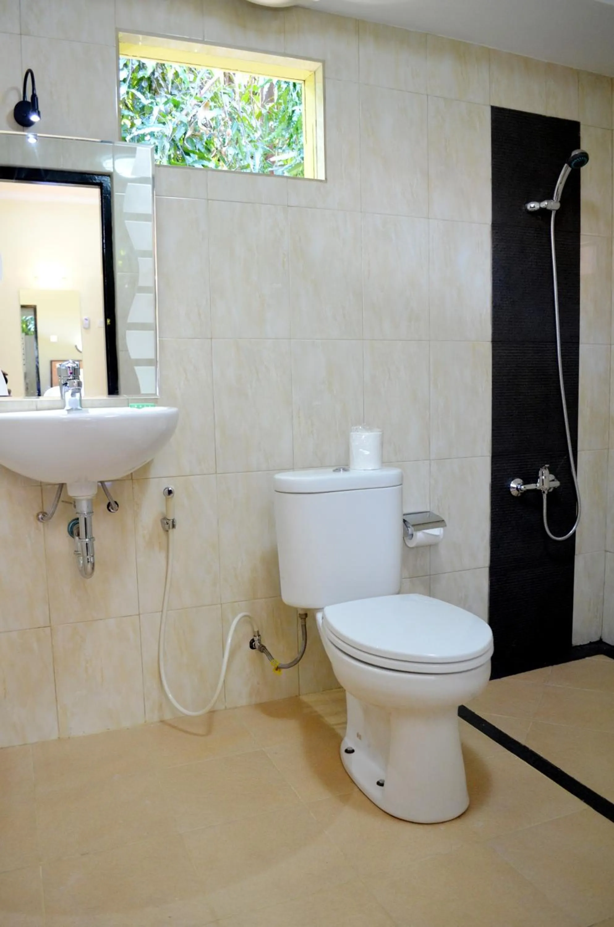 Bathroom in Troppo Zone Puri Rama Resort Kuta