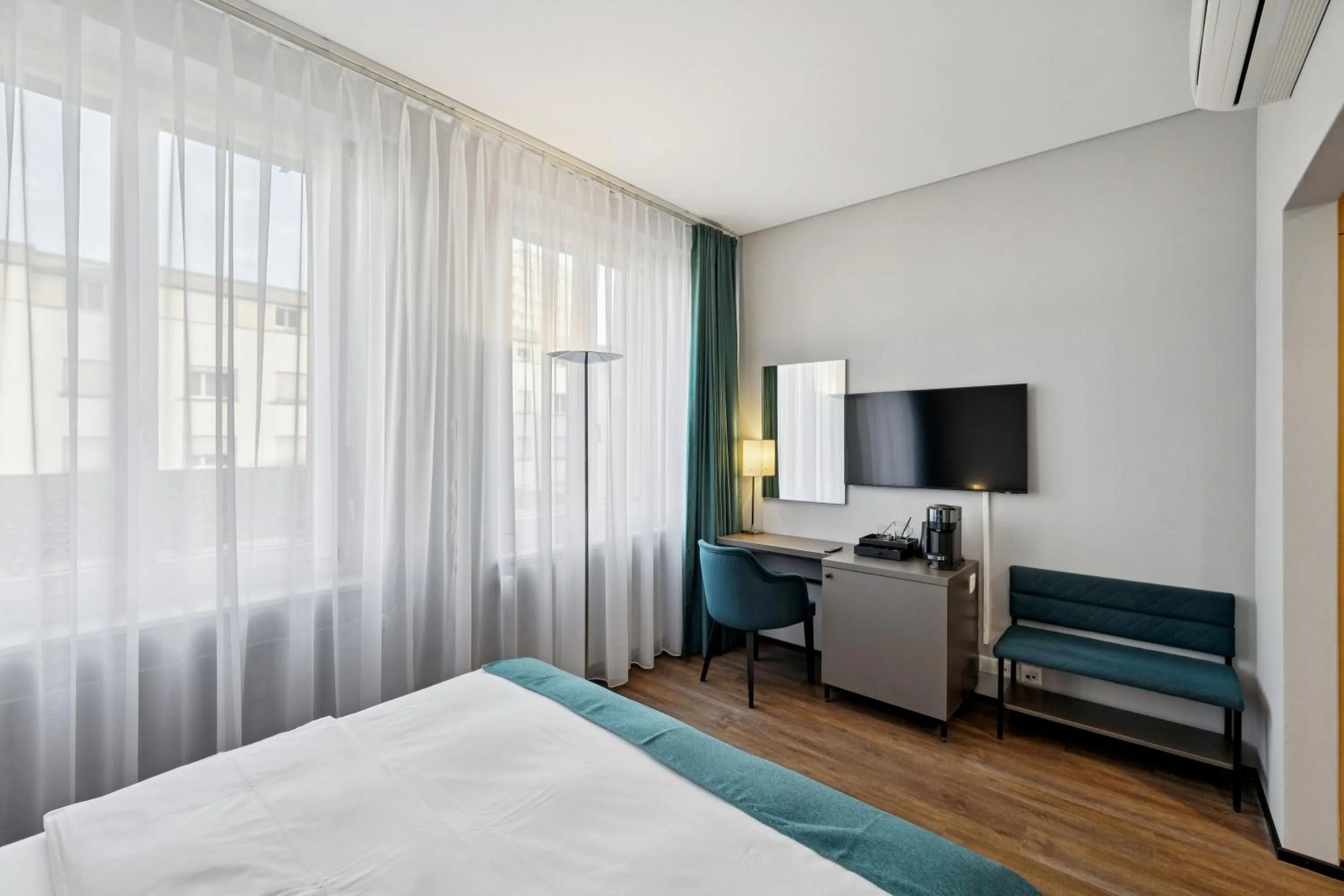 Bed in GLANDON Rooms Elite