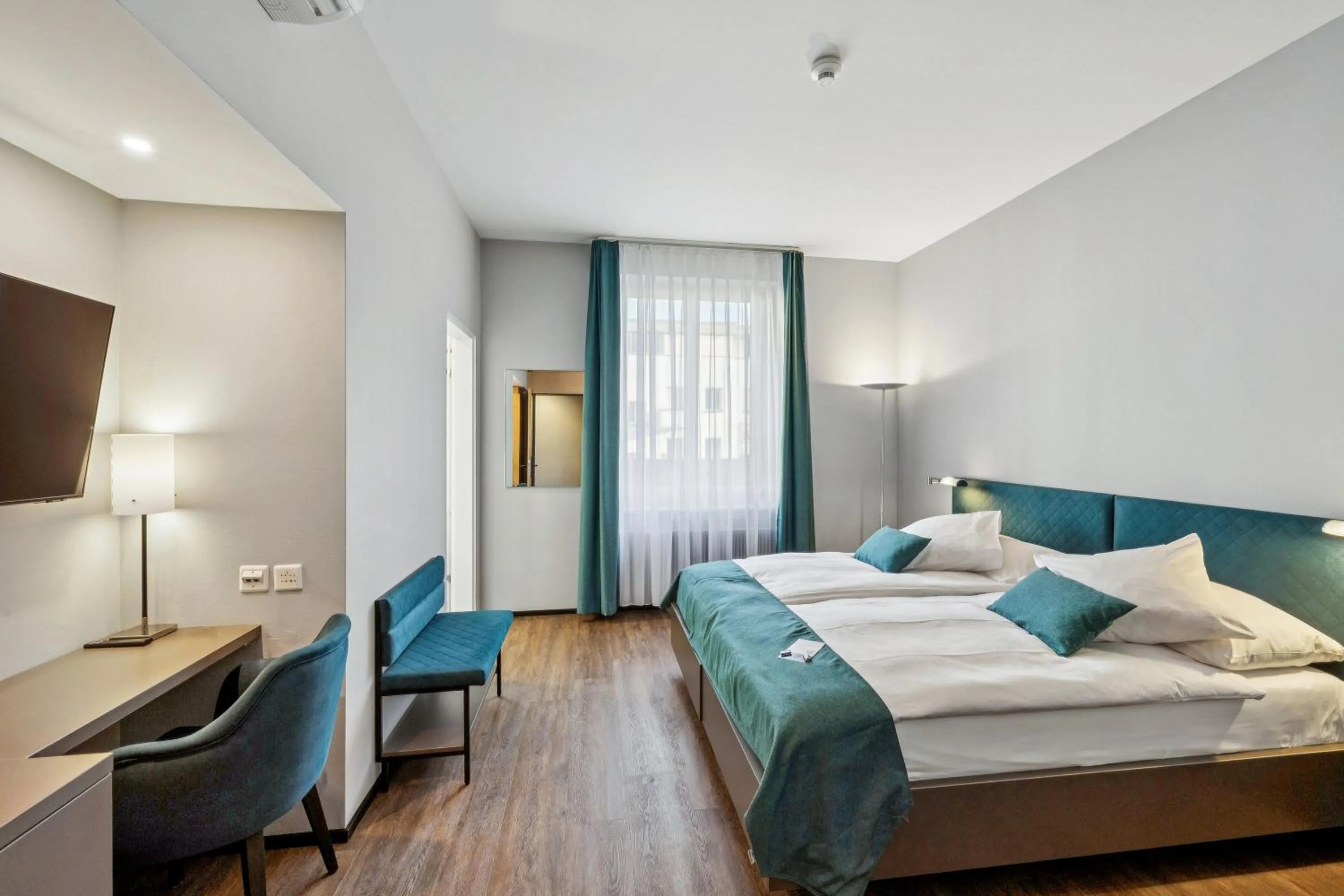 Bed in GLANDON Rooms Elite